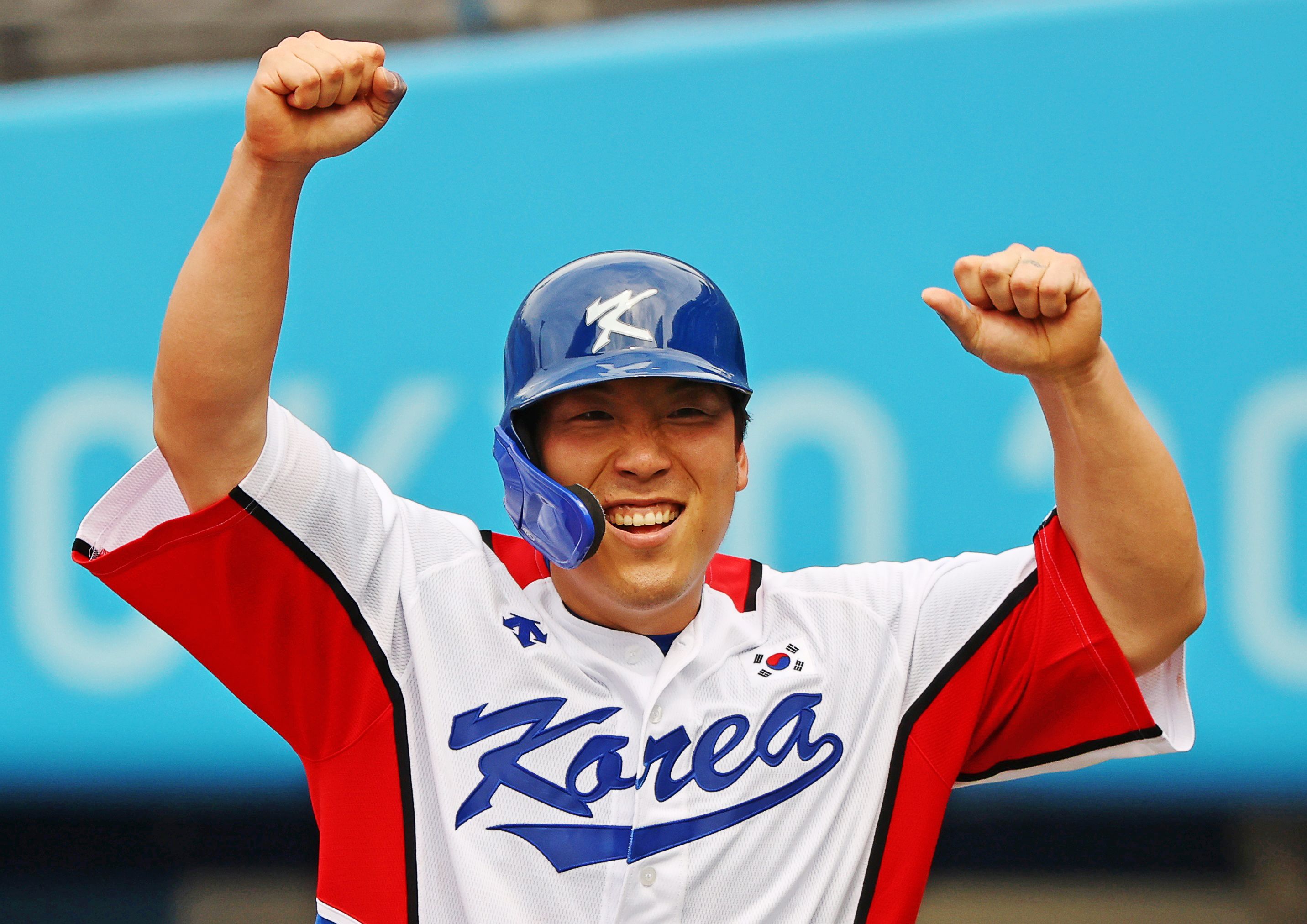Baseball-Japan, South Korea clinch spots in final four
