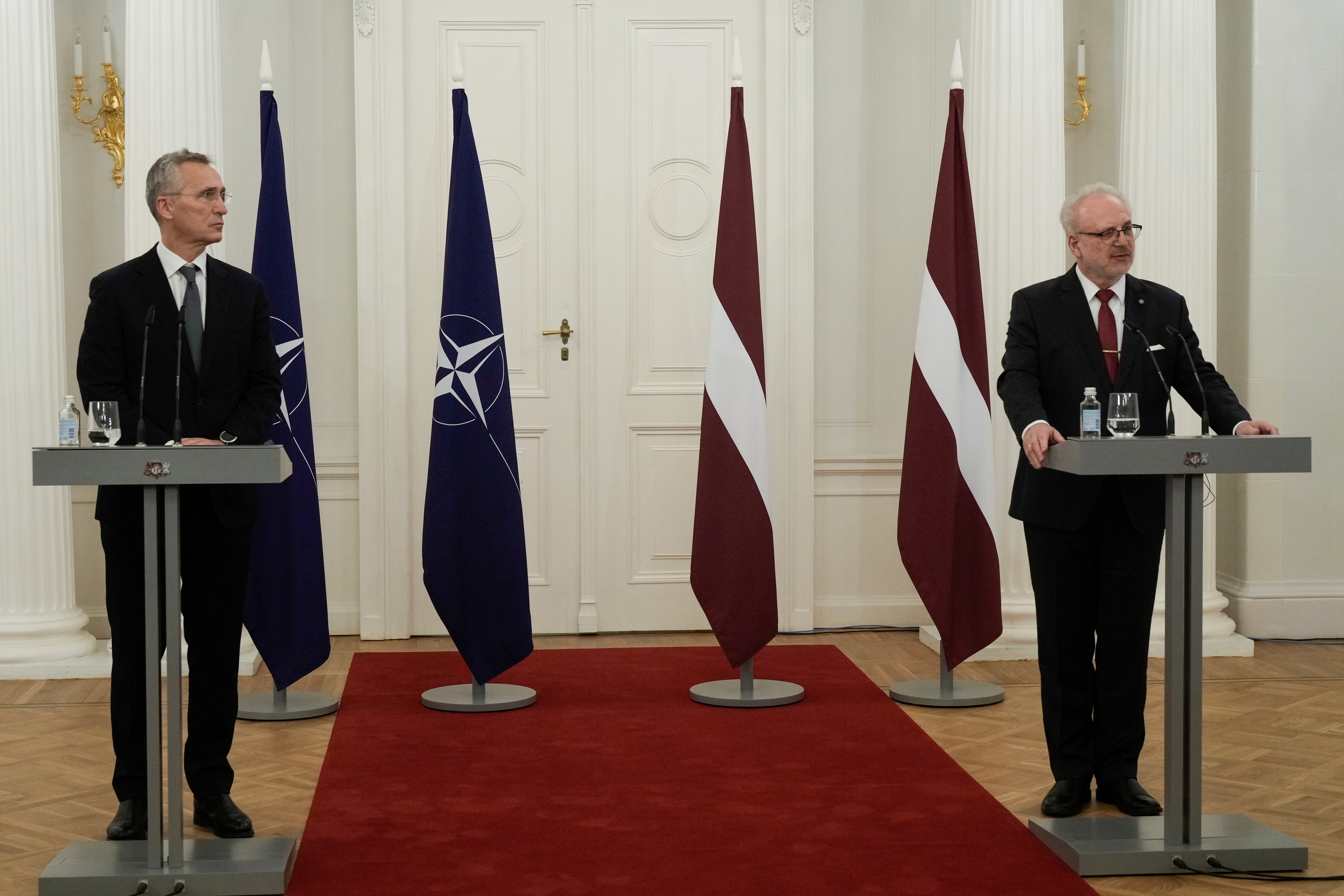 Latvian President Egils Levits and NATO Secretary General Jens Stoltenberg attend a news conference in Riga, Latvia November 29, 2021. REUTERS/Ints Kalnins