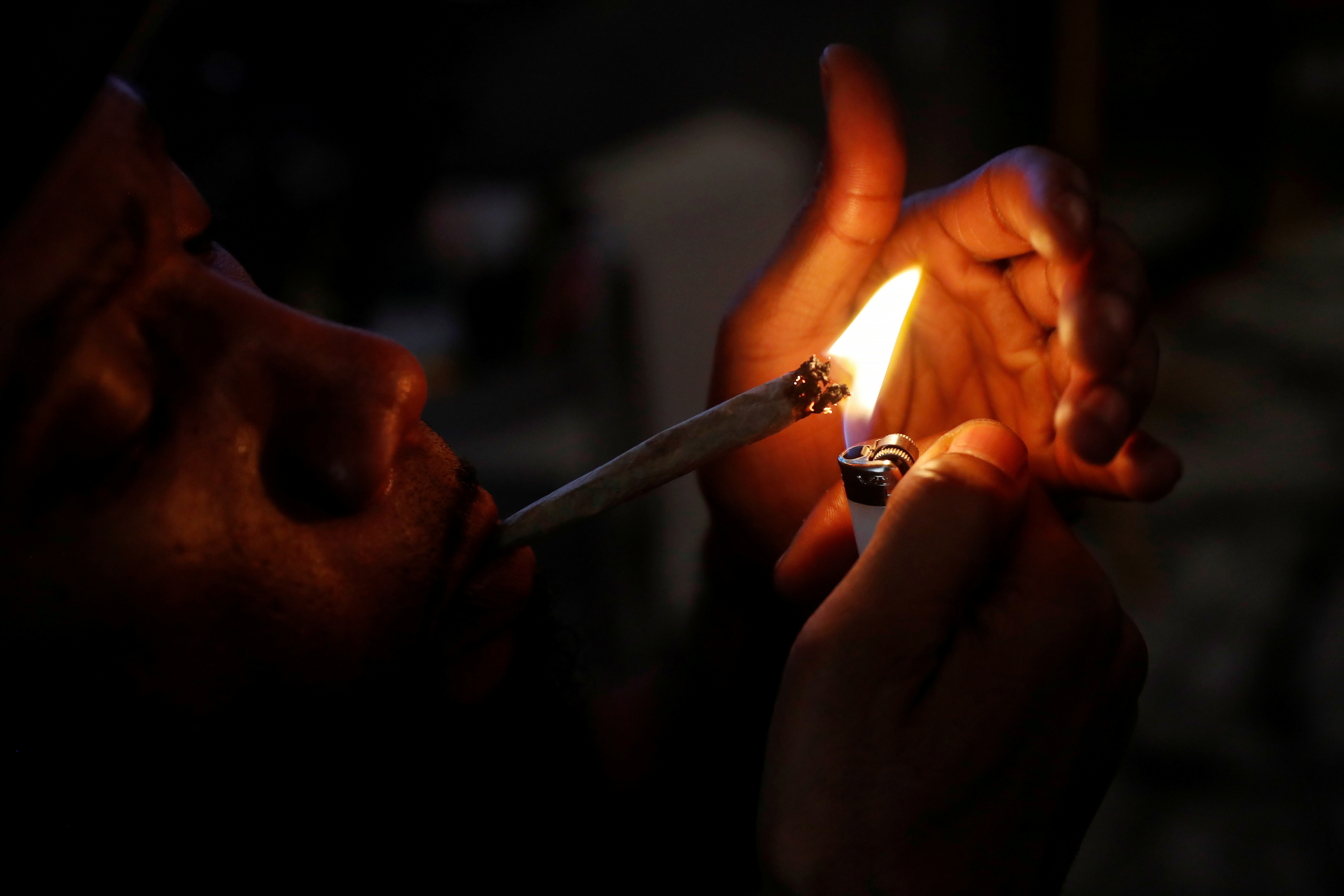Cannabis entrepreneur Fetti smokes a hybrid strain joint of his marijuana brand 