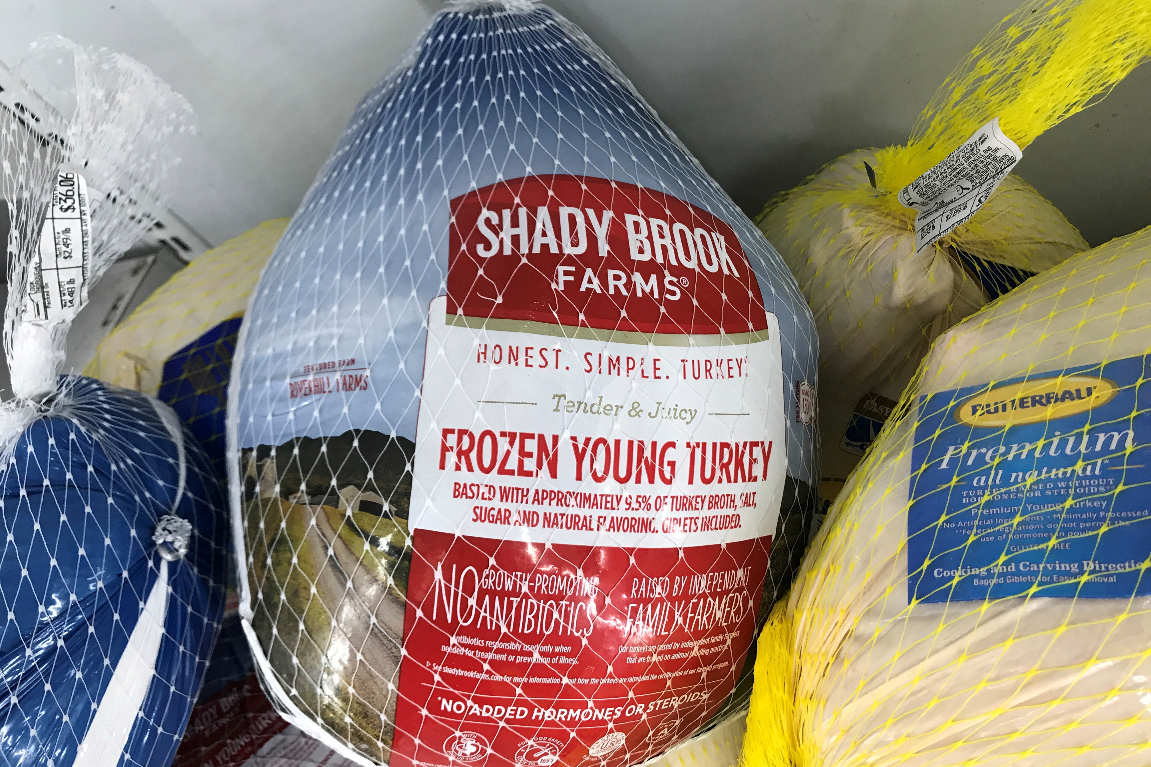 Frozen turkeys are pictured in a freezer case