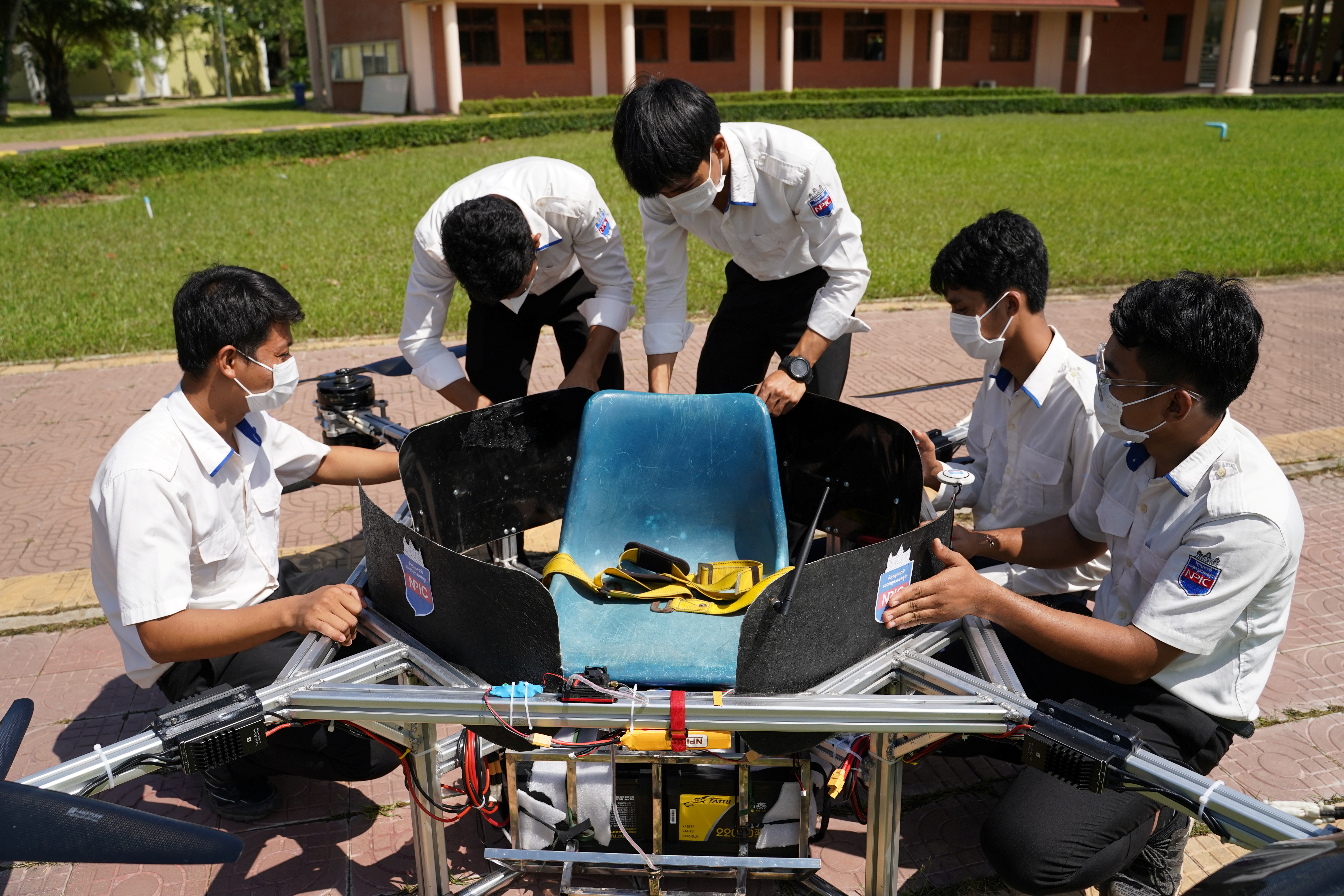 Students of the National Polytechnic Institute of Cambodia prepare their manned drone for flight in Phnom Penh, Cambodia, September 17, 2021. REUTERS/Cindy Liu