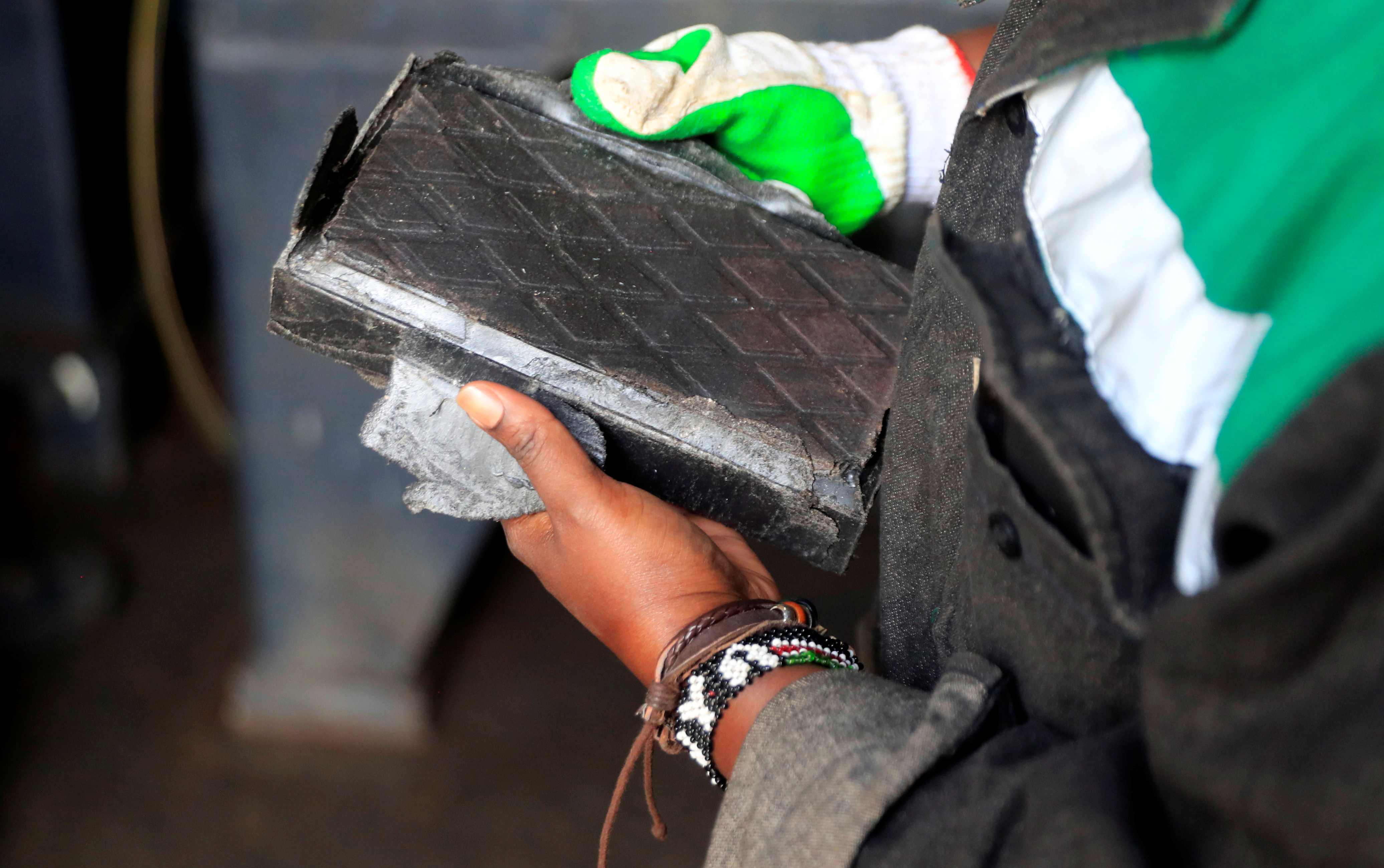 Kenyan entrepreneur recycles plastic waste into building blocks in Nairobi