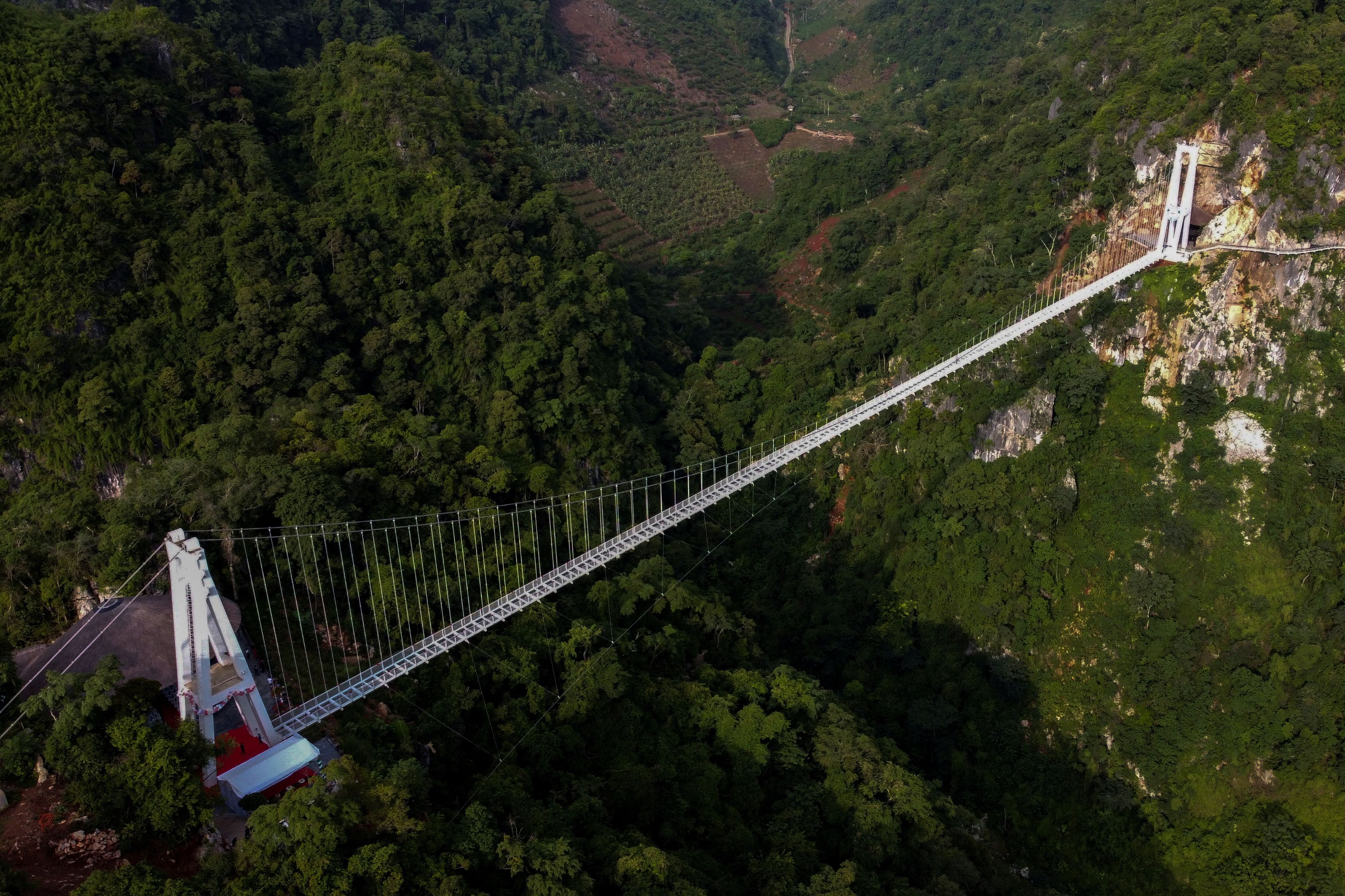 Vietnam opens the world's longest glass-bottom bridge in hopes to attract daring visitors