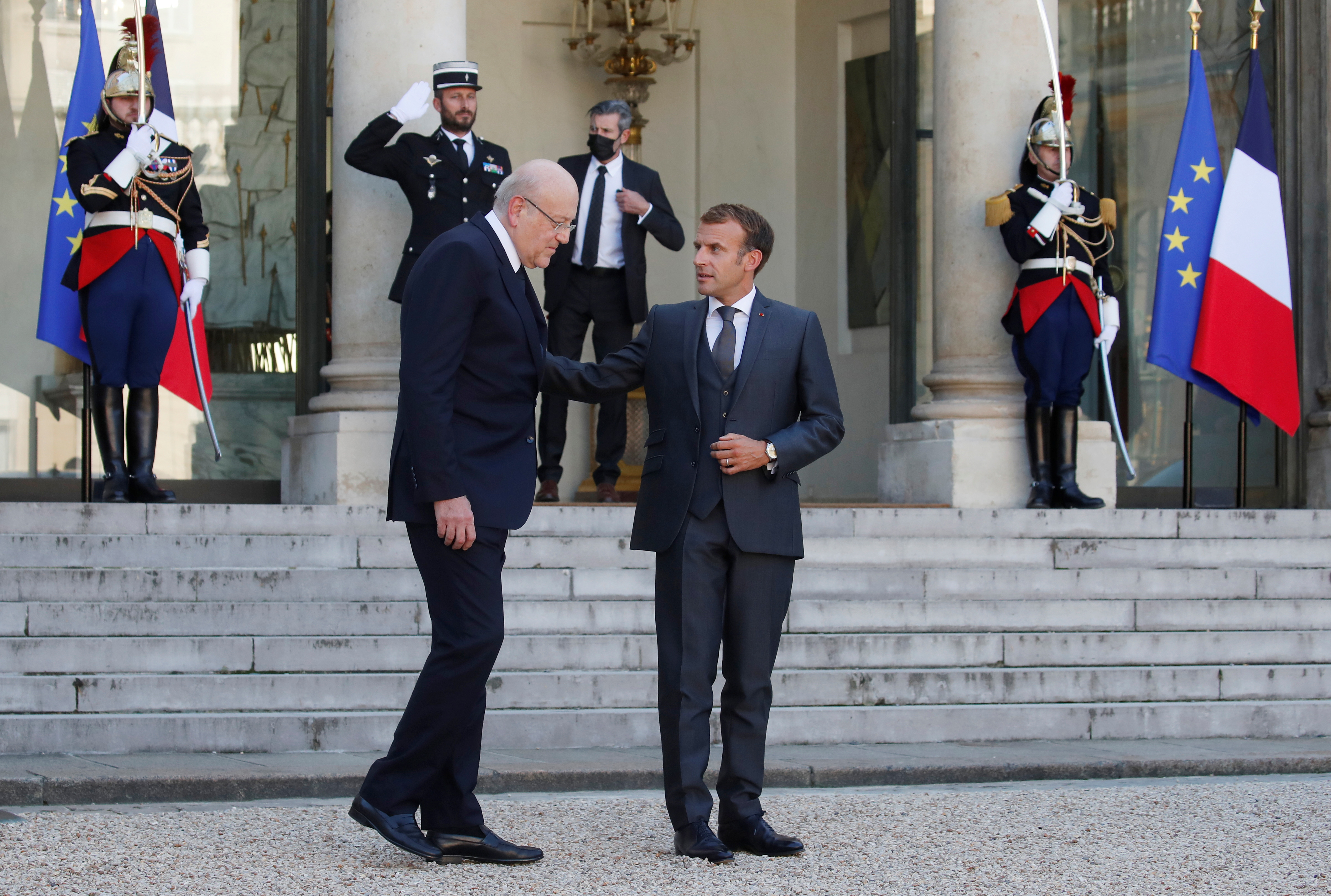 French President Emmanuel Macron meets Lebanon's Prime Minister Najib Mikati in Paris