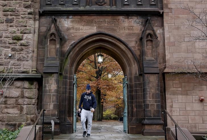 Student walks on the campus of Yale University in New Haven, Connecticut