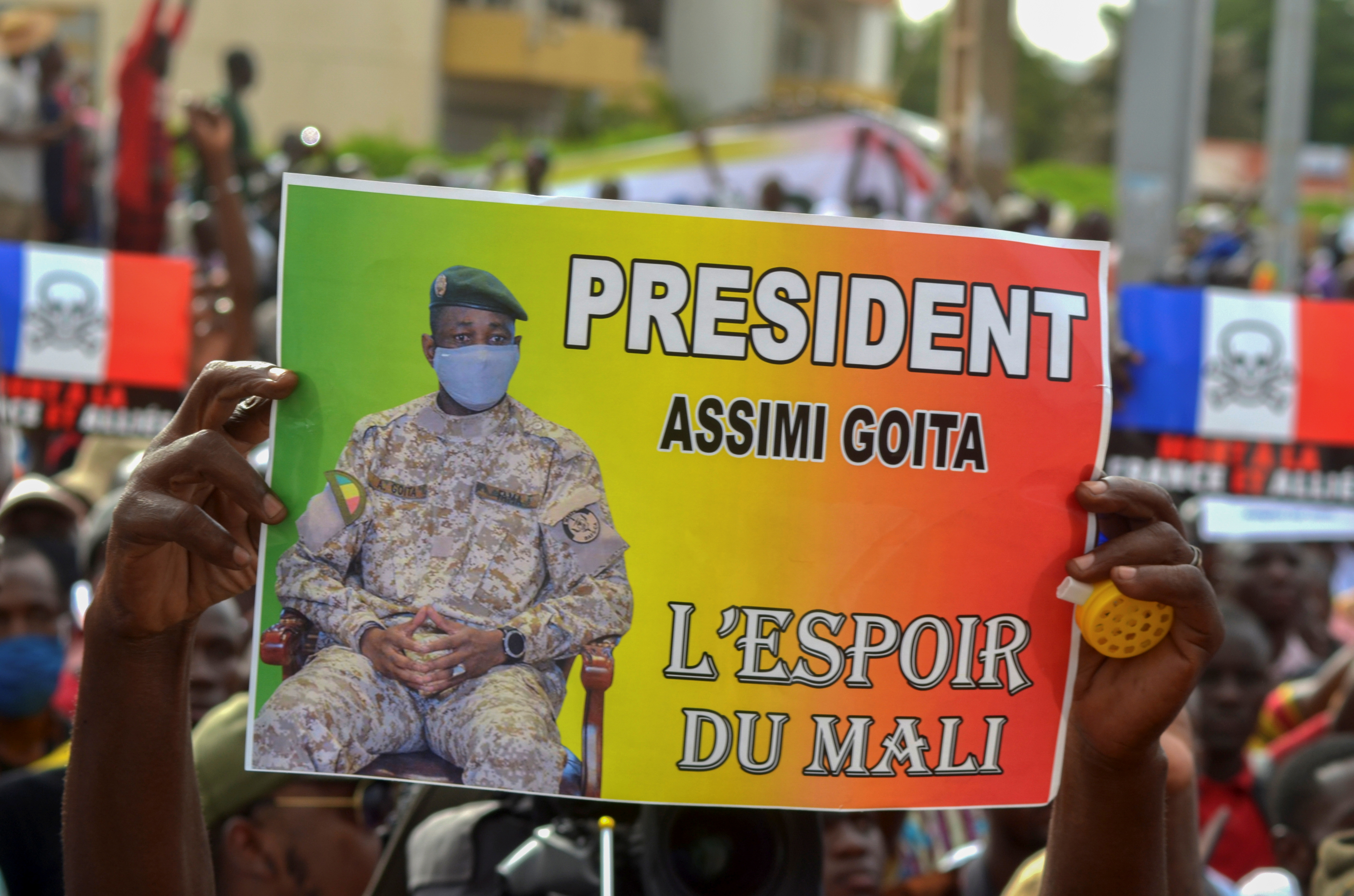 Supporters of Mali's M5-RFP opposition coalition, gather during a rally at the Independence Square in Bamako