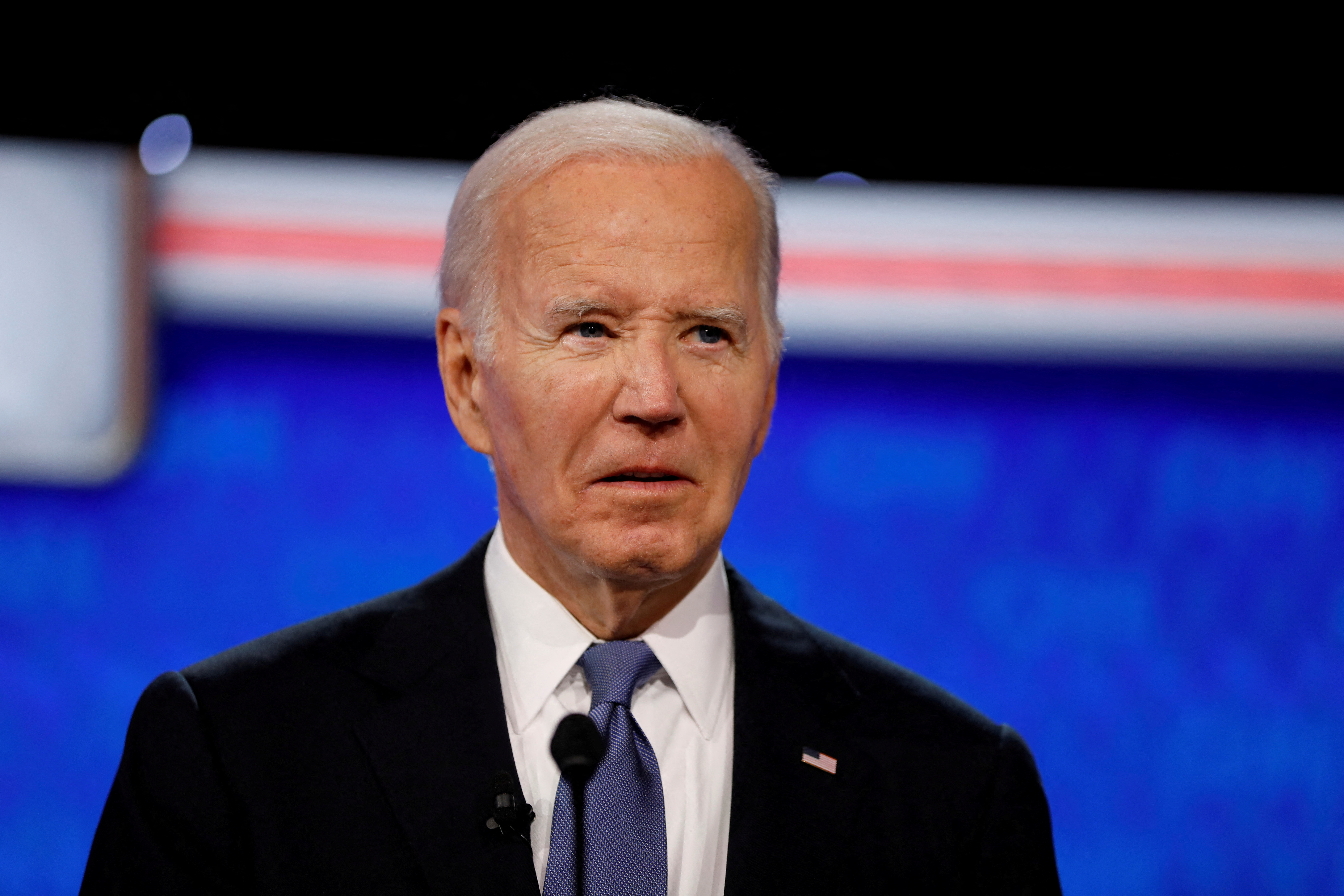 Biden says he 'nearly fell asleep' during debate after world travel | Reuters