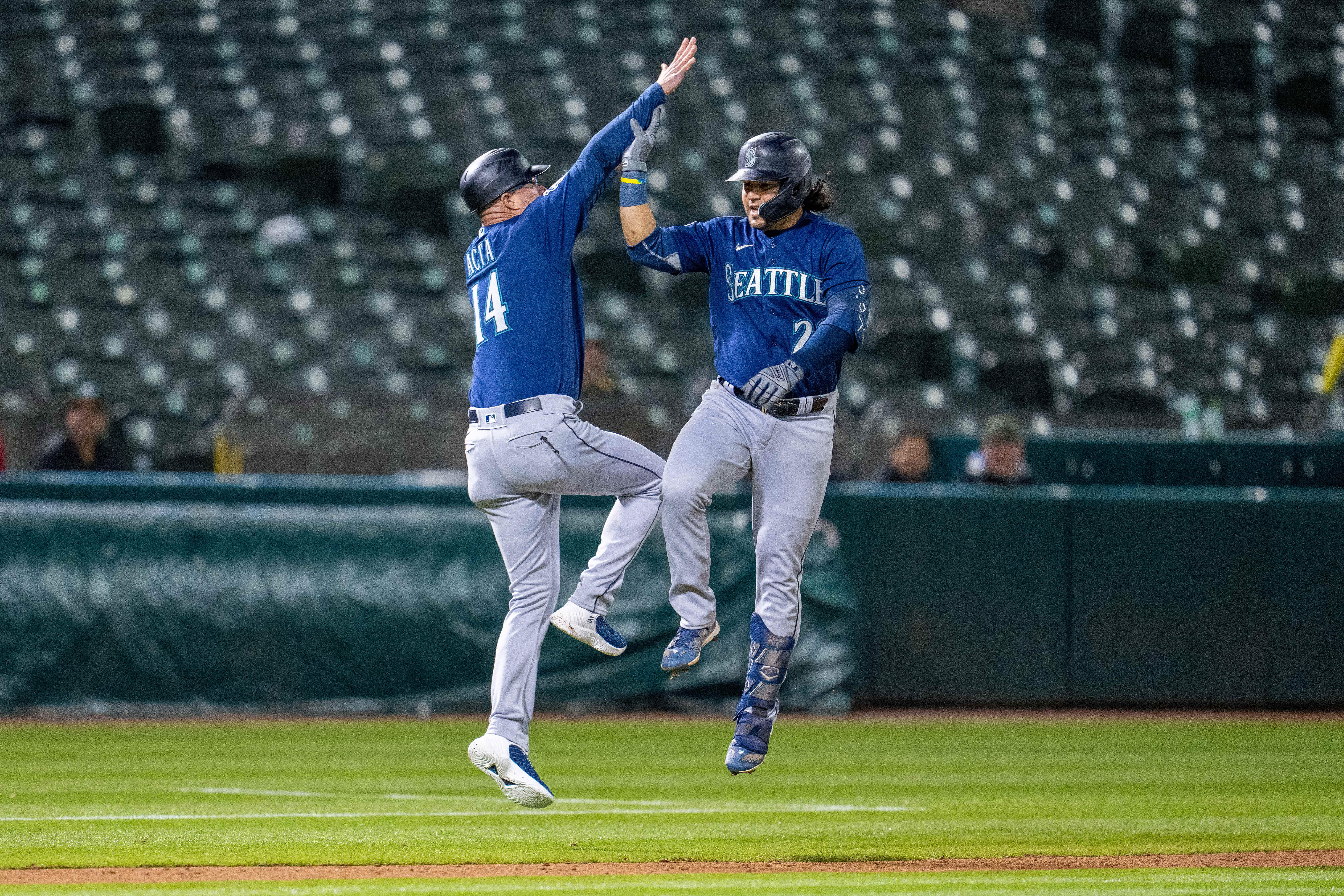 Mariners rally late, post five-run 10th to sink Athletics