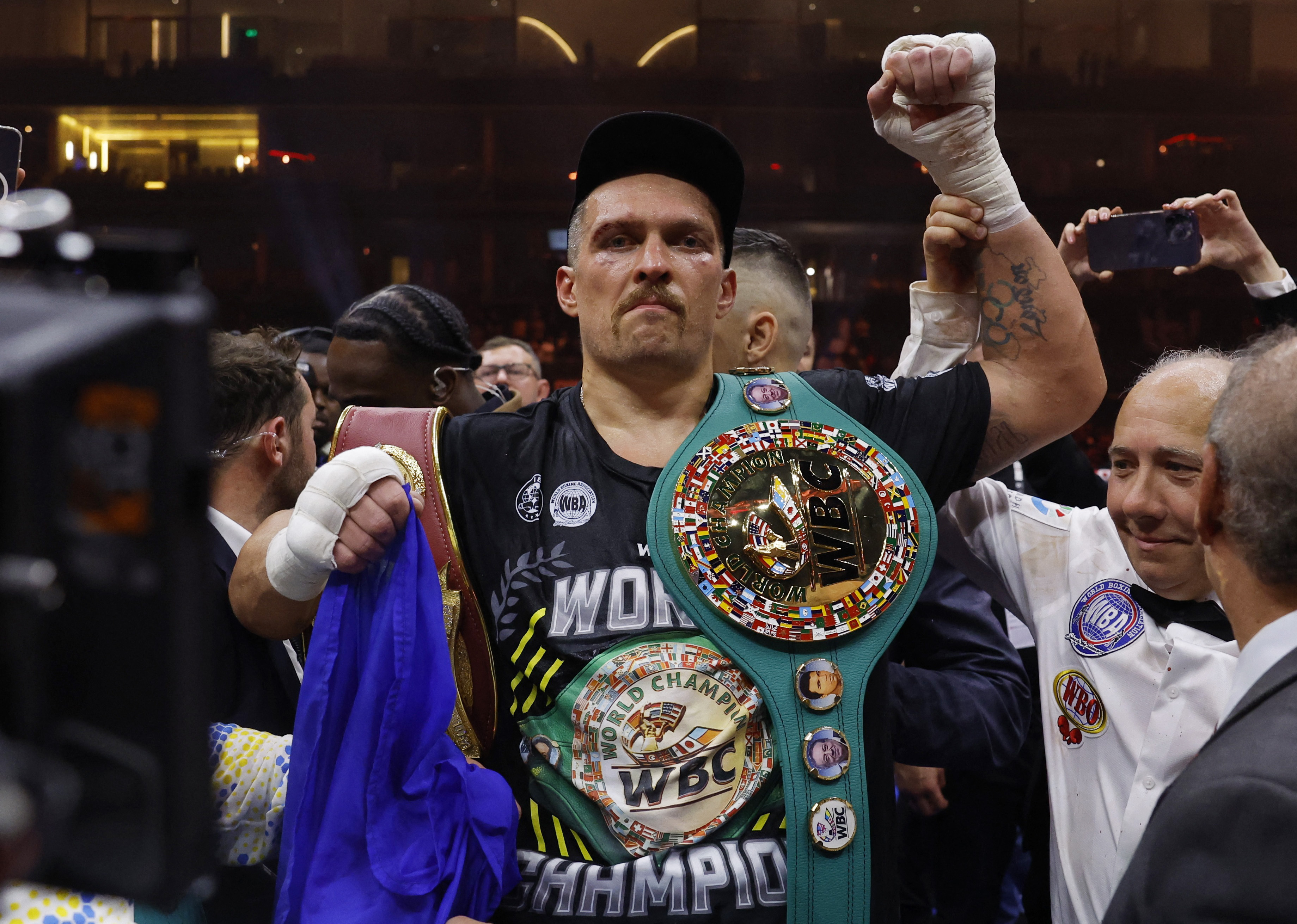 Olympic-Boxing-Heavyweight champion Usyk promises payout if Ukrainians win  medals | Reuters