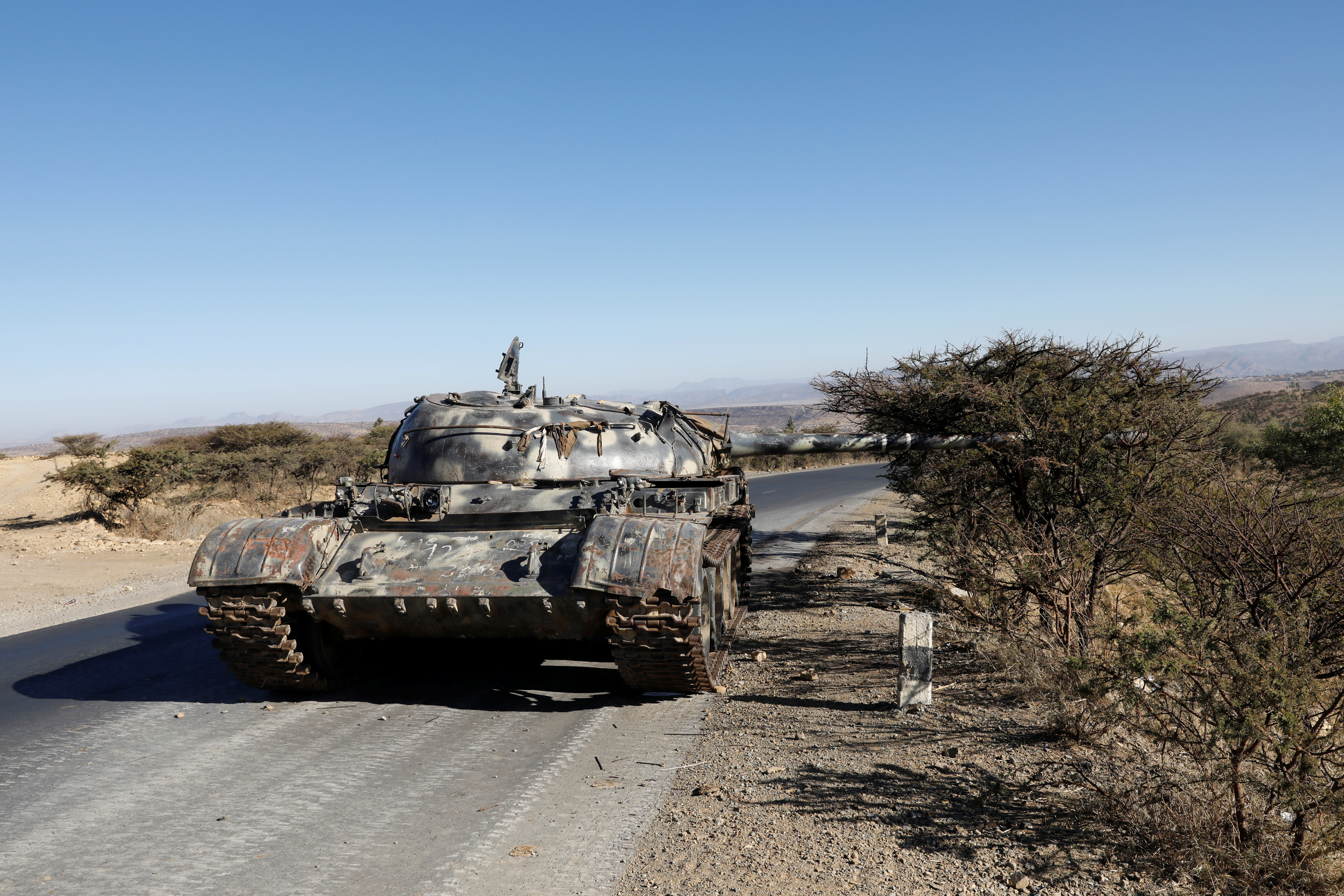 A damaged Eritrean military tank is seen near the town of Wikro