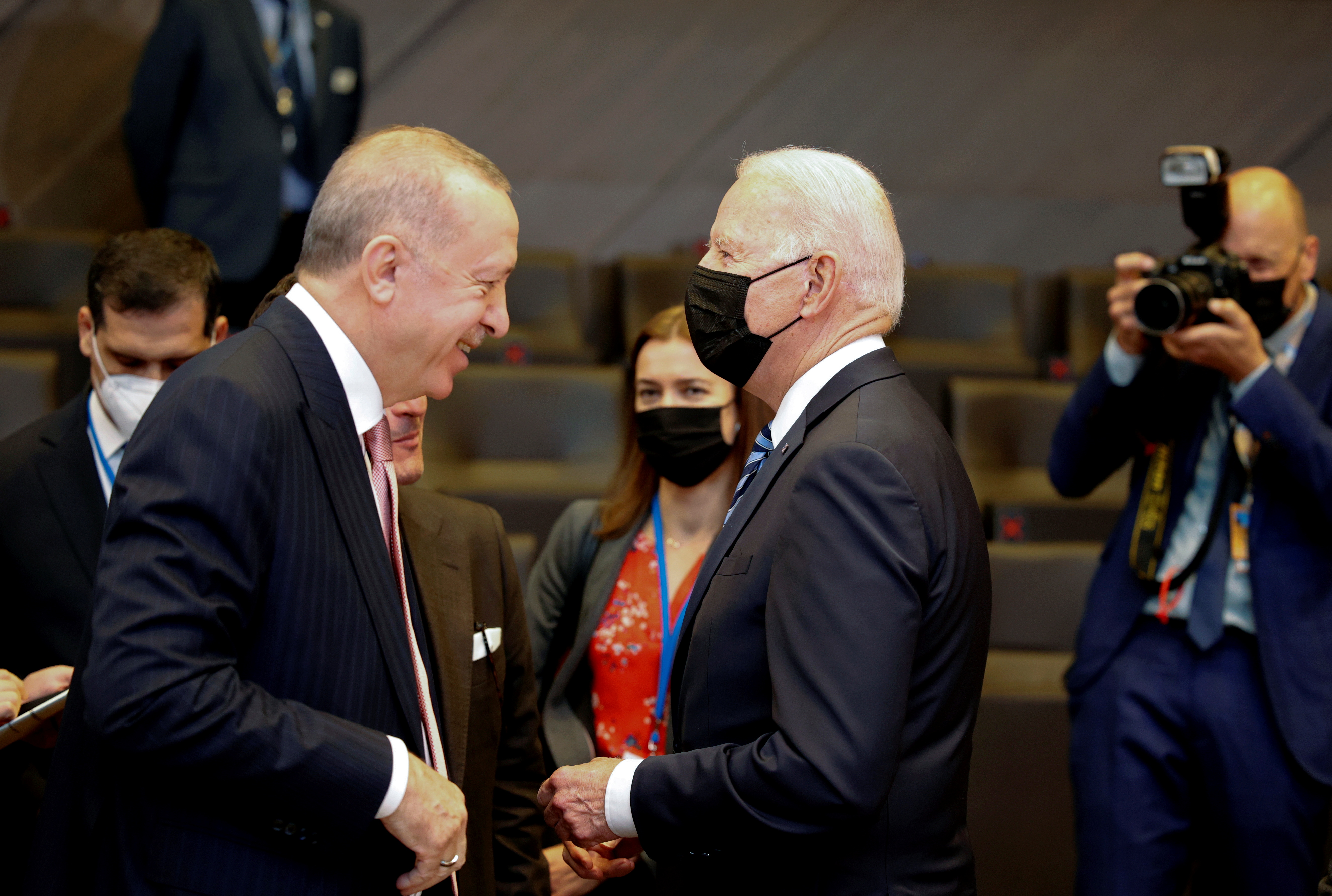Turkey's President Tayyip Erdogan speaks with U.S. President Joe Biden during a plenary session at a NATO summit in Brussels, Belgium, June 14, 2021. Olivier Matthys/Pool via REUTERS