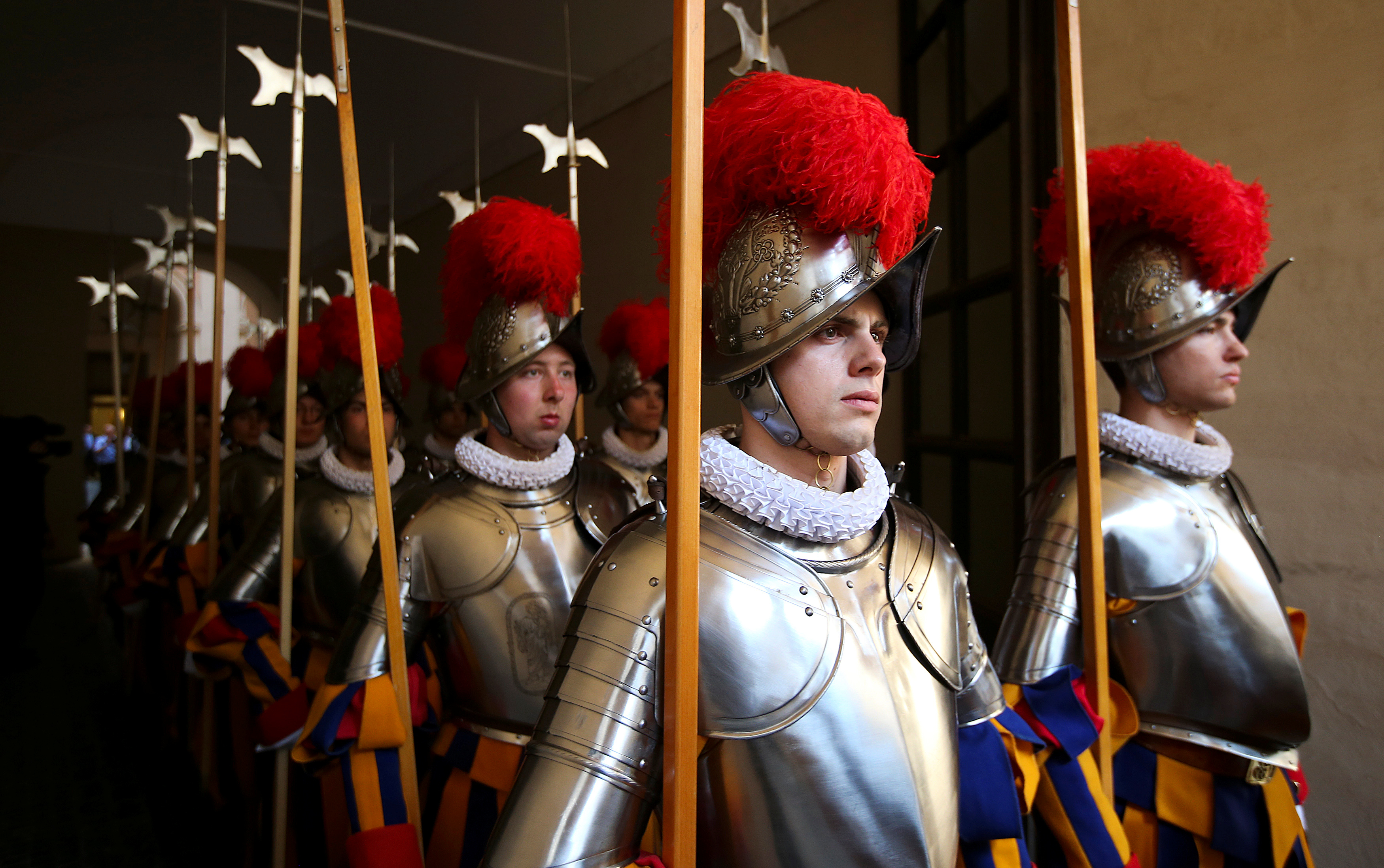 New recruits of the Vatican's elite Swiss Guard march during a swearing-in ceremony at the Vatican
