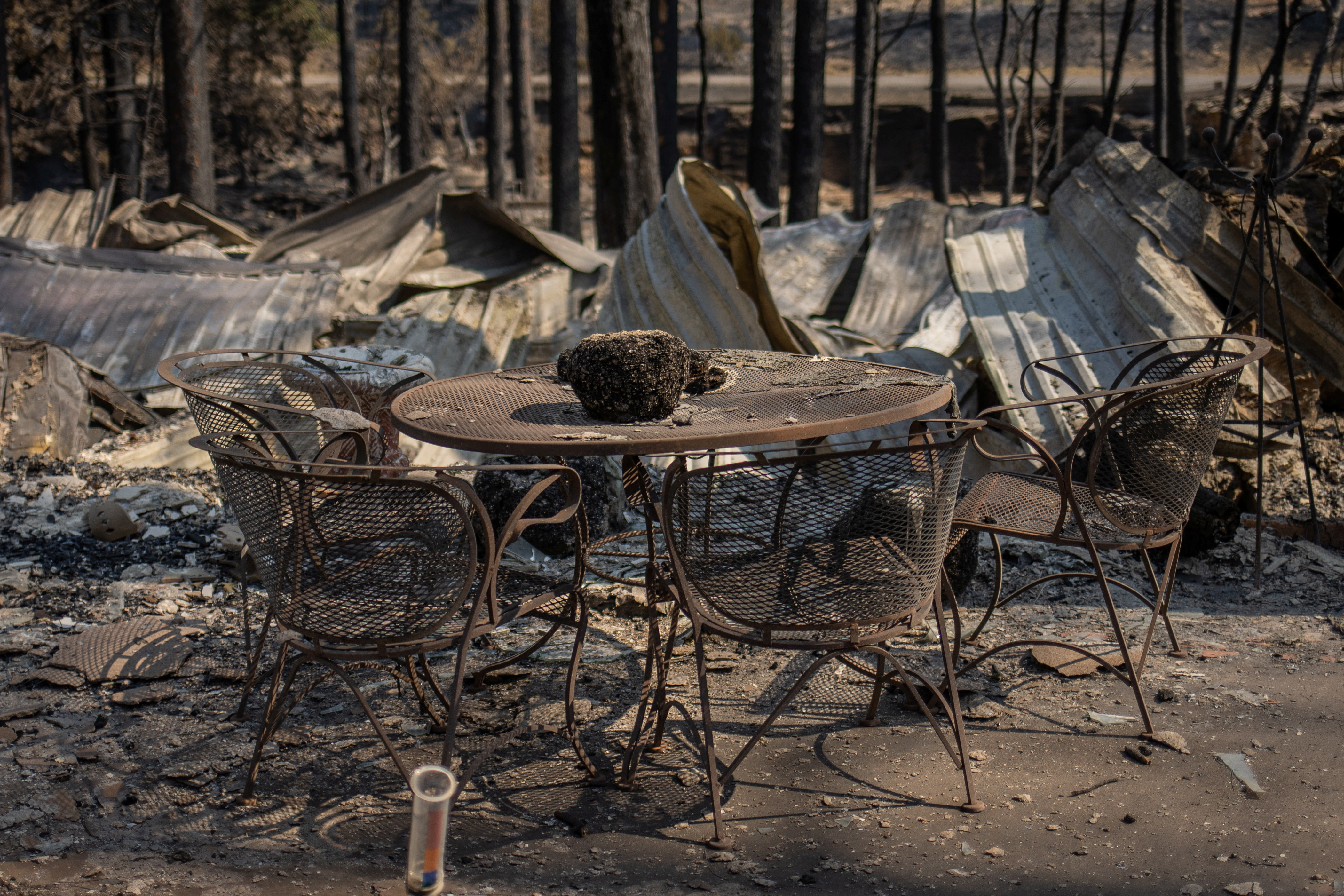 Destroyed furniture sits outside levelled residence in aftermath of South Fork fire in Alto, New Mexico
