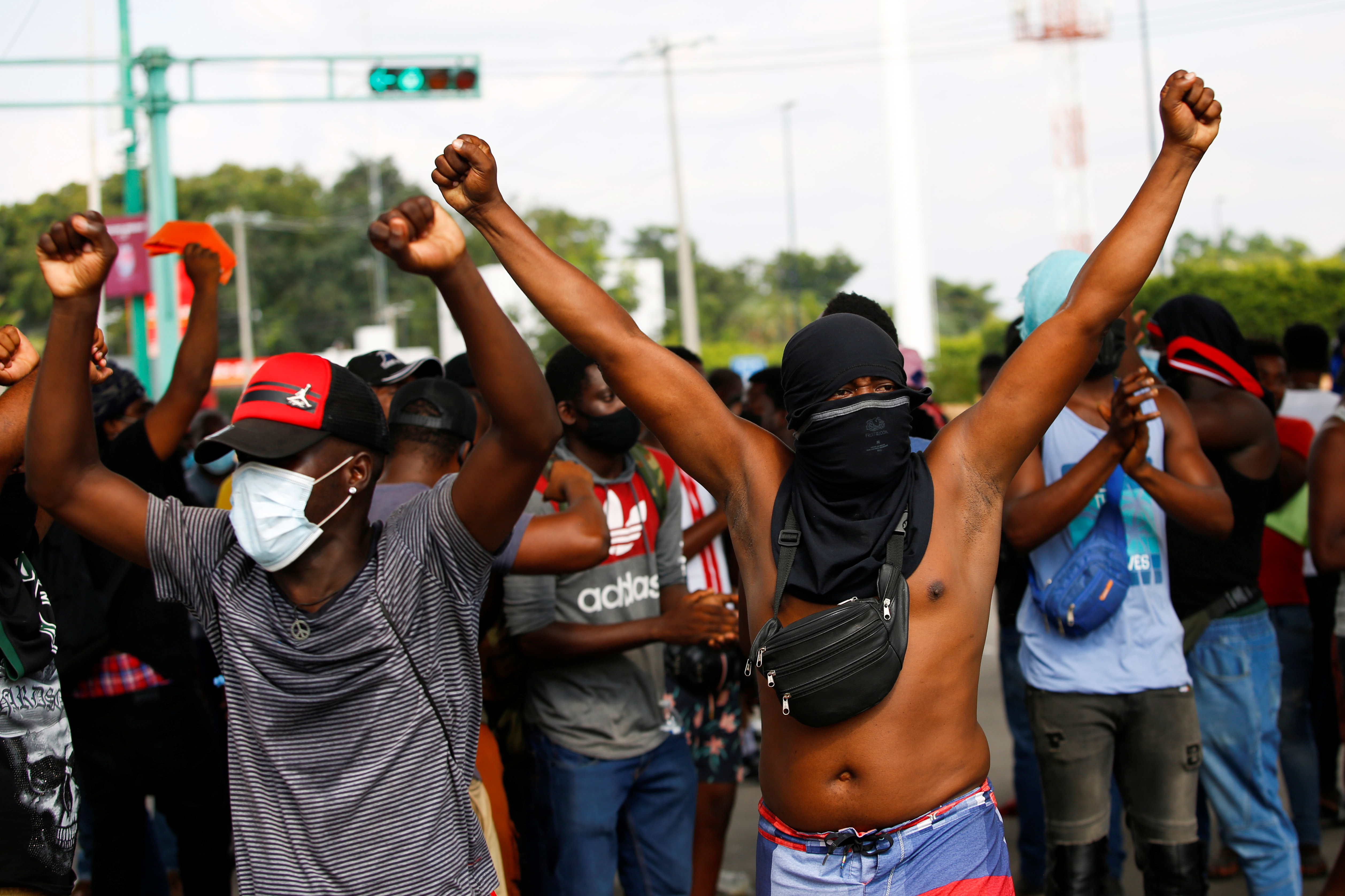 Migrants protest after Mexican authorities cancelled the process to apply for humanitarian visas, in Tapachula