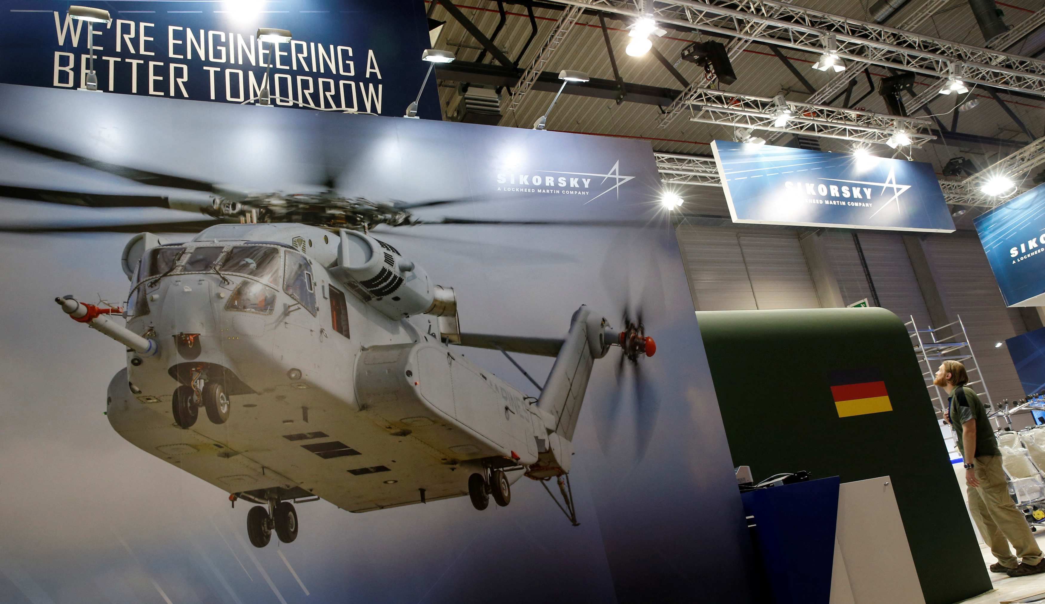 A photograph of a CH-53 helicopter is pictured at the booth of Sikorsky - Lockheed Martin company during preparation for the ILA Berlin Air Show in Schoenefeld, south of Berlin, Germany, May 31, 2016.    REUTERS/Fabrizio Bensch/File Photo