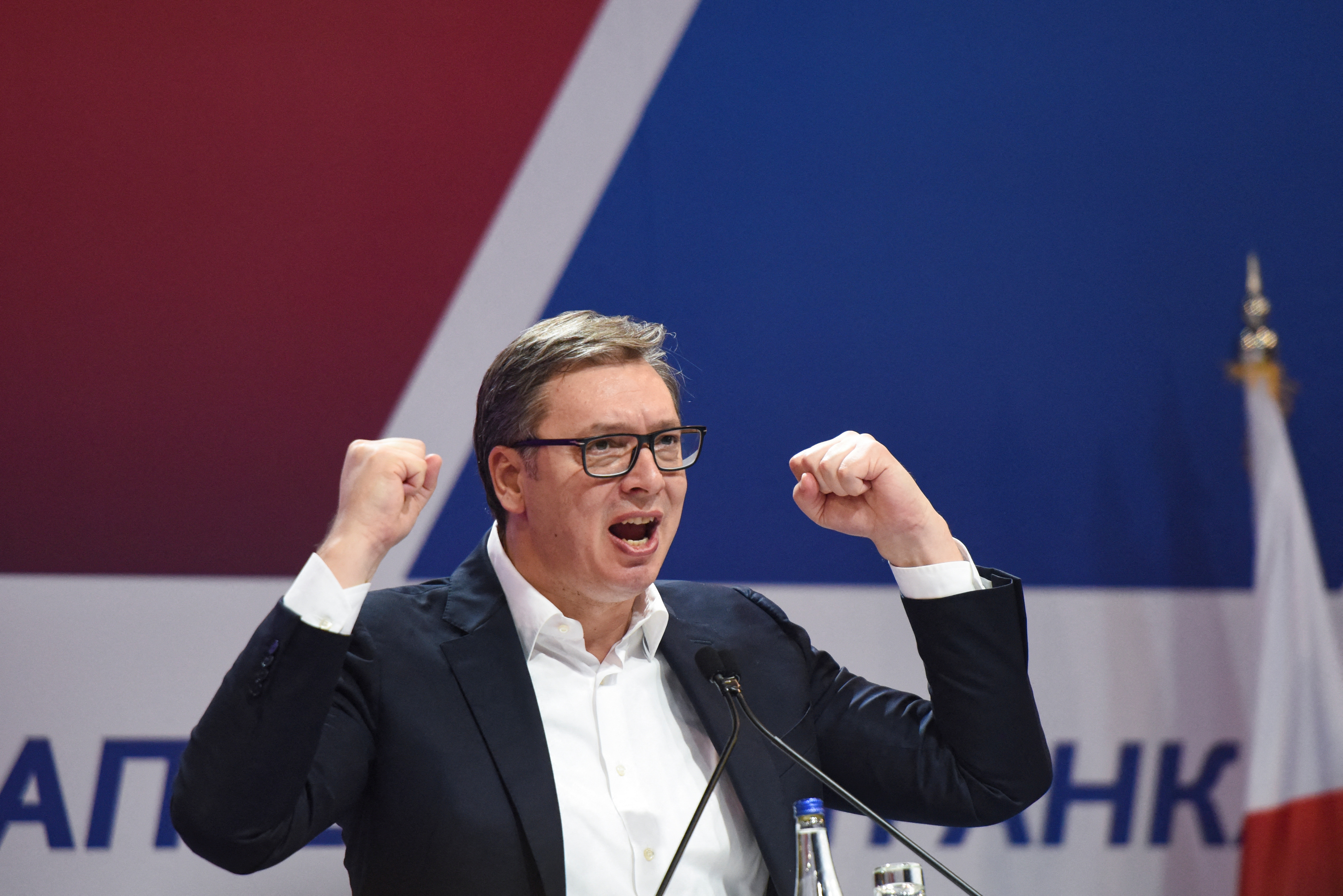 Aleksandar Vucic, the presidential candidate of the ruling SNS party, reacts during a rally in Belgrade