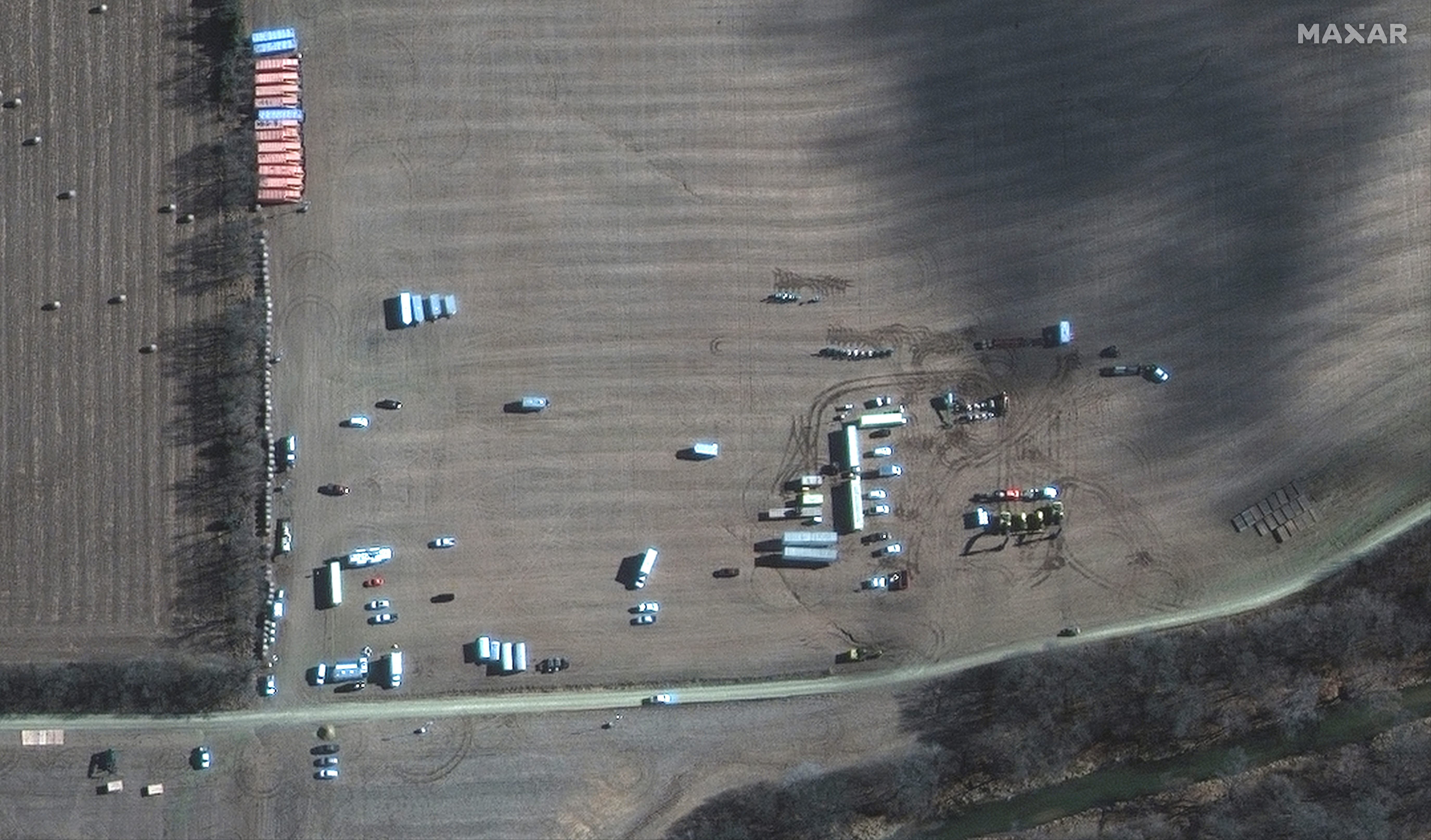 A satellite image shows emergency crews working to clean up crude oil pipeline spill along Mill Creek, in Kansas