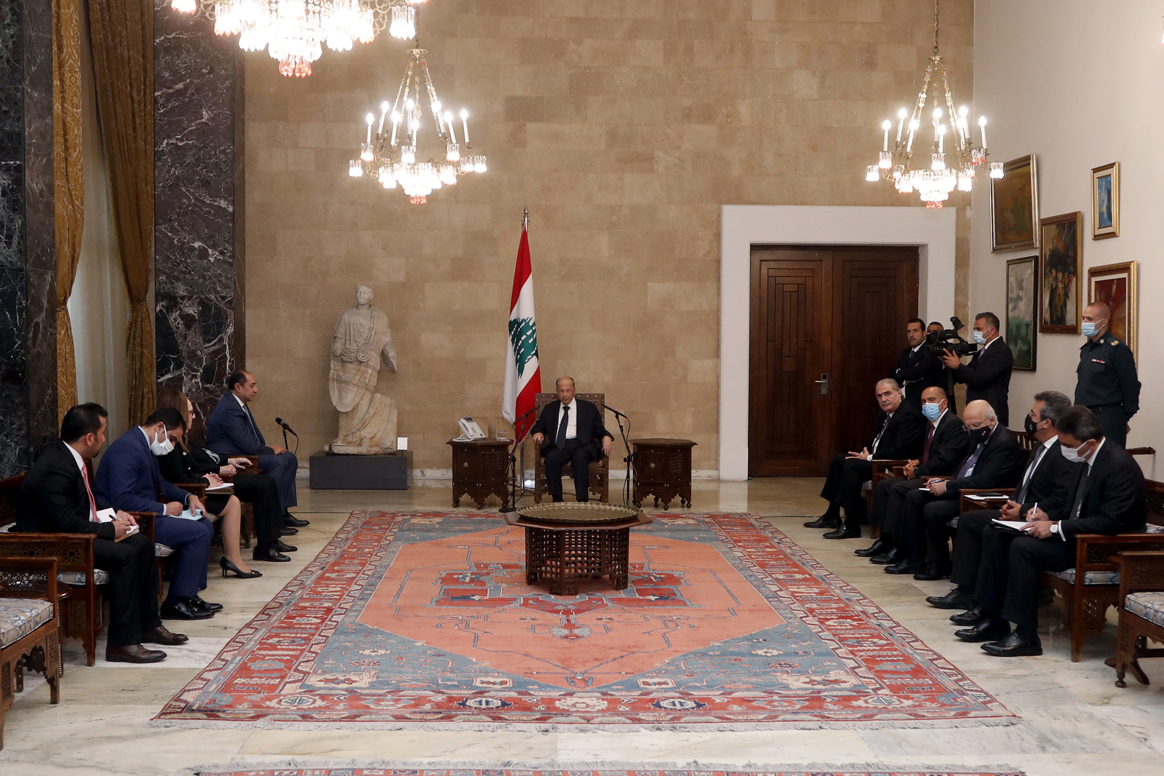 Lebanon's President Michel Aoun meets with Assistant Secretary General of the Arab League Hossam Zaki at the presidential palace in Baabda