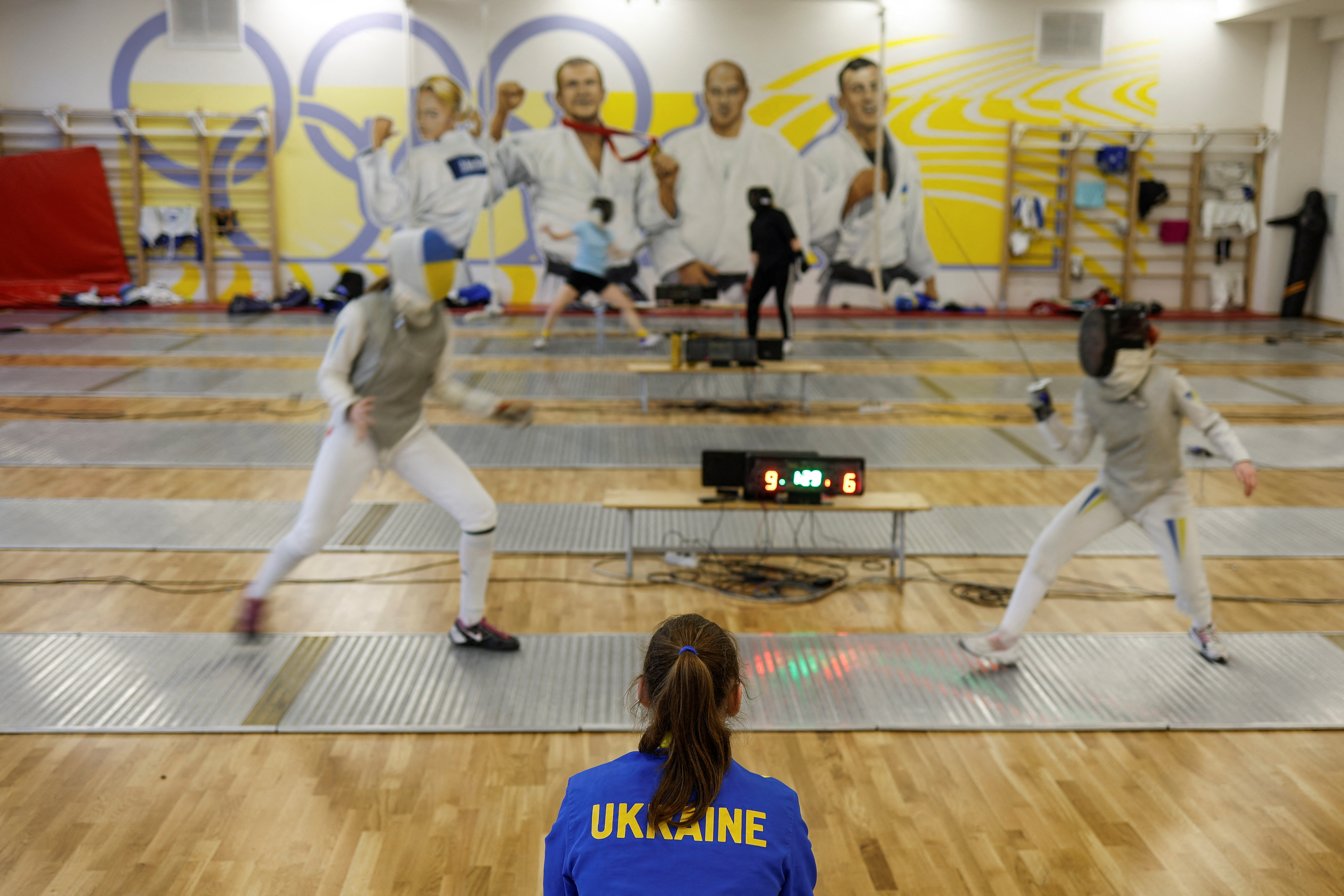 Members of Ukraine's fencing team attend a training session at the Olympic training base in Kyiv