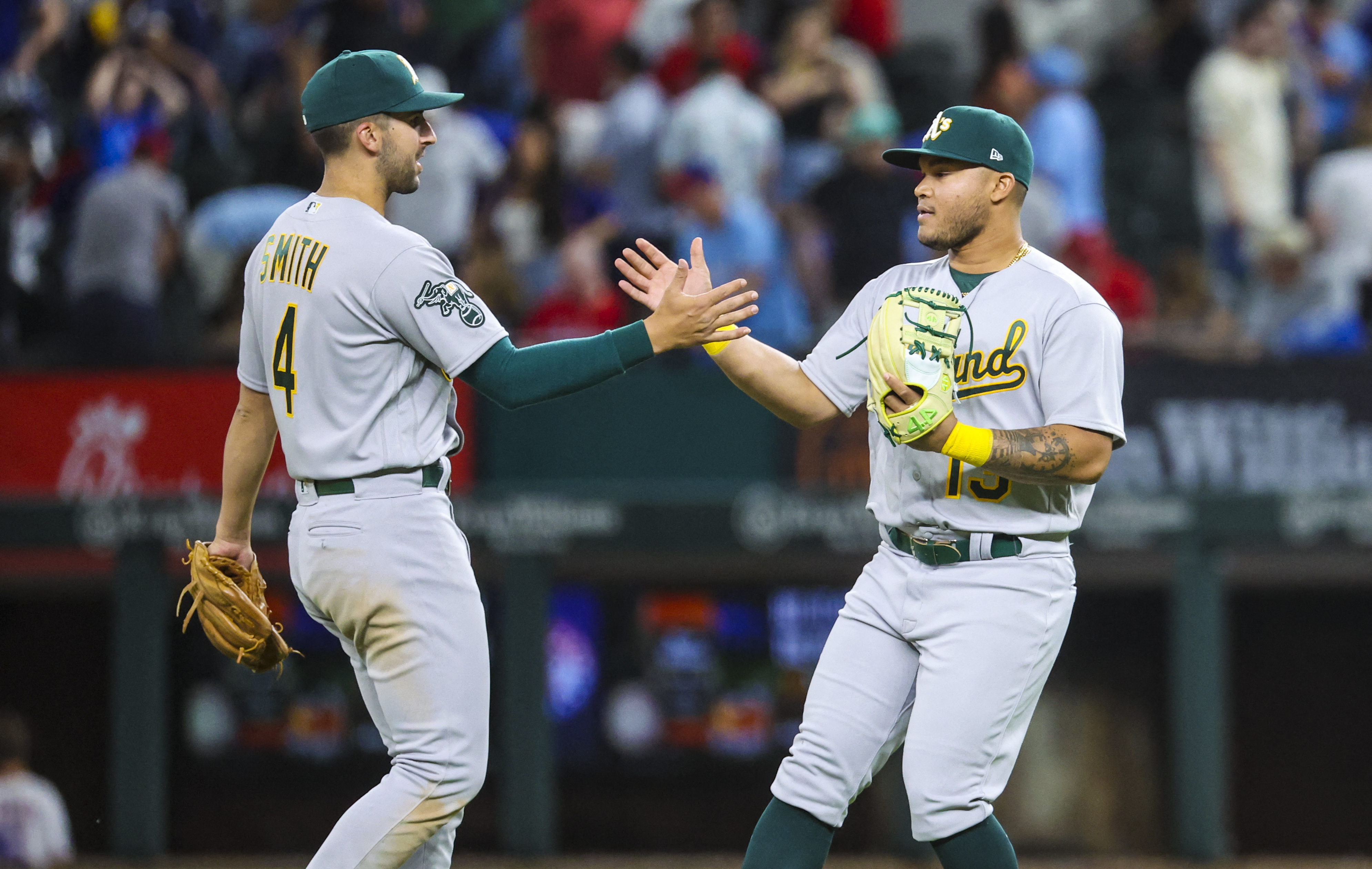 Pinder's 12th-inning slam lifts A's over Rangers 14-7