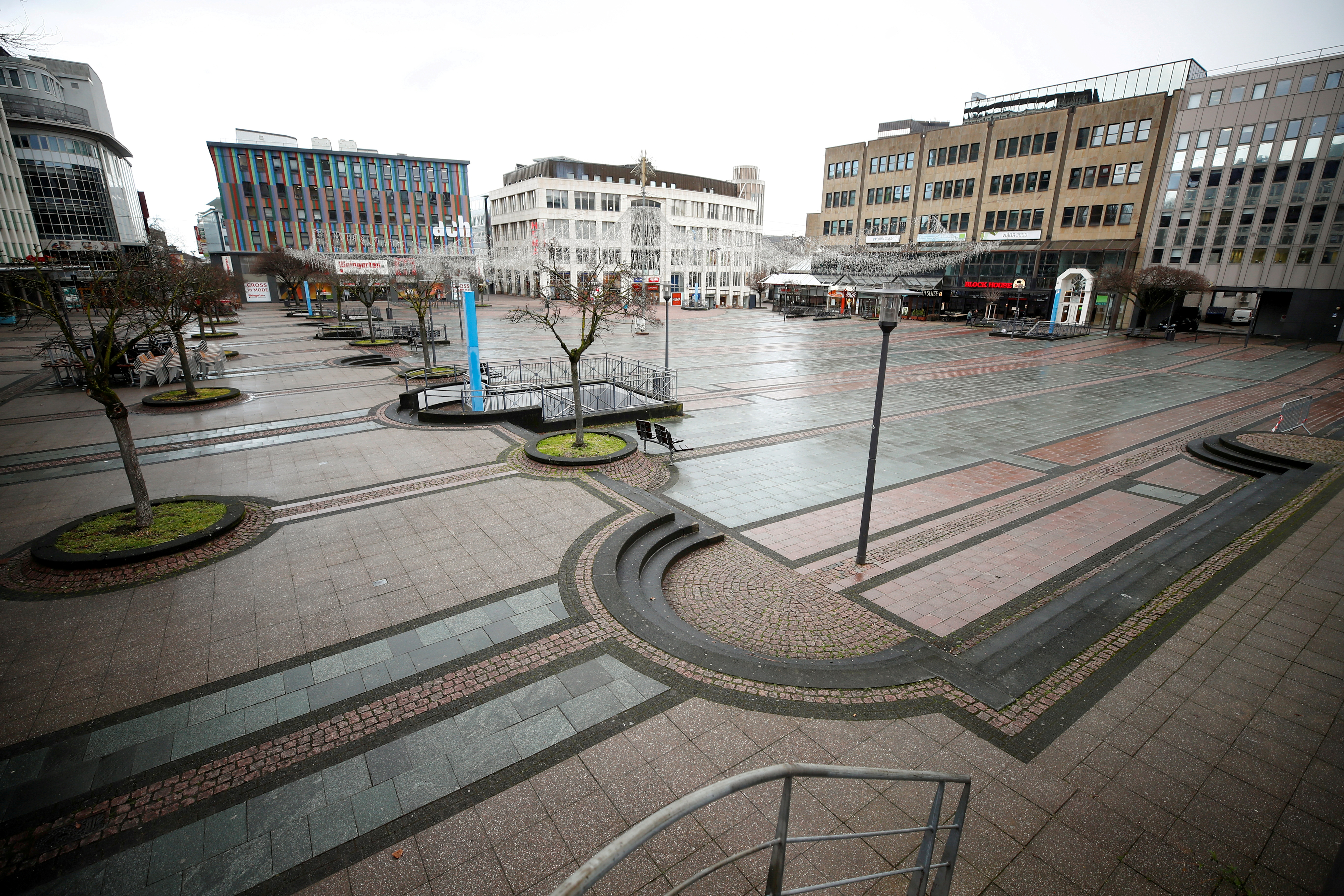 Picture shows the abandoned Kennedy Square due to the coronavirus disease (COVID-19) pandemic lockdown in downtown Essen, Germany, March 11, 2021. REUTERS/Wolfgang Rattay/File Photo