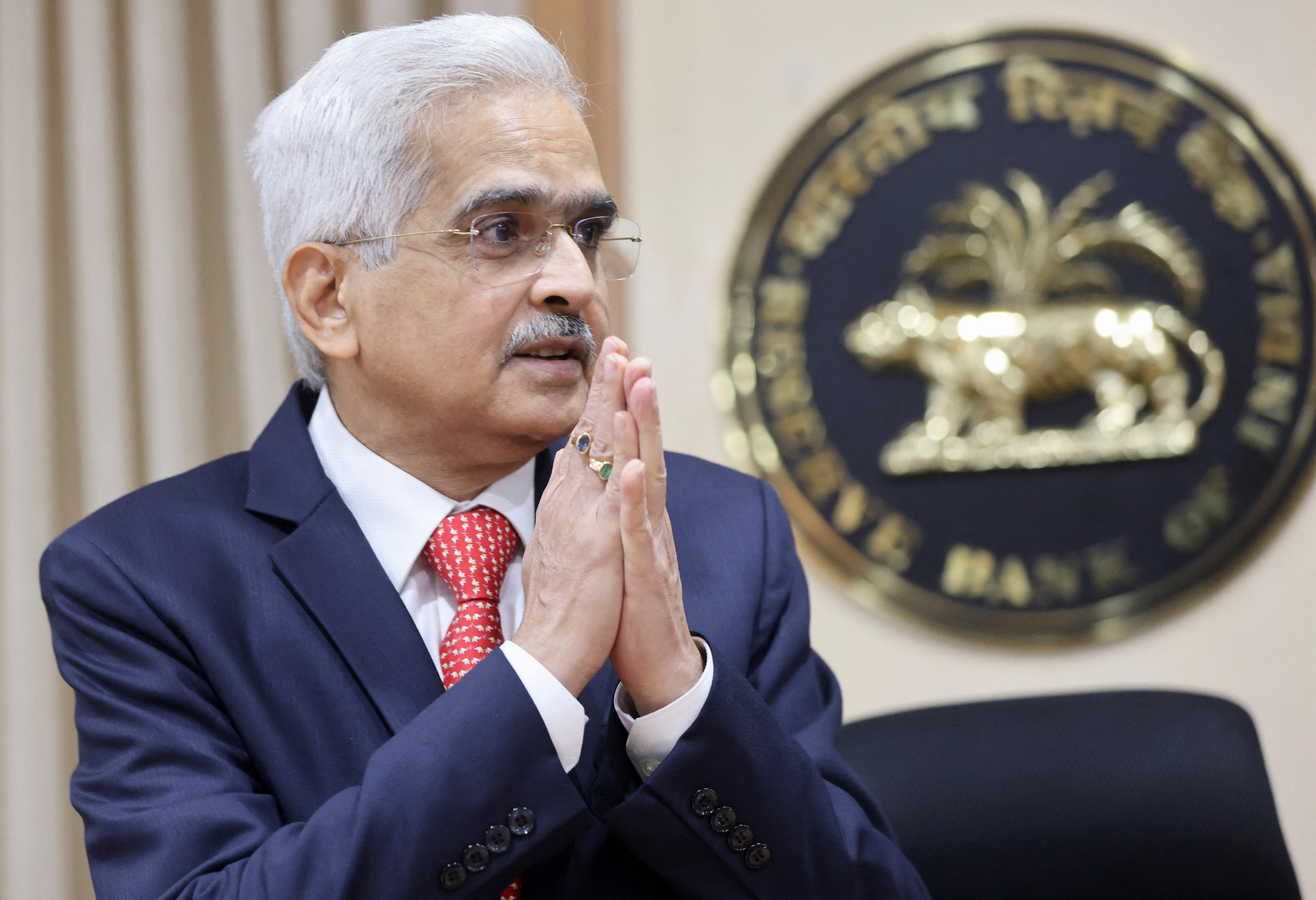 The Reserve Bank of India (RBI) Governor Shaktikanta Das greets the media as he arrives at a news conference after a monetary policy review in Mumbai