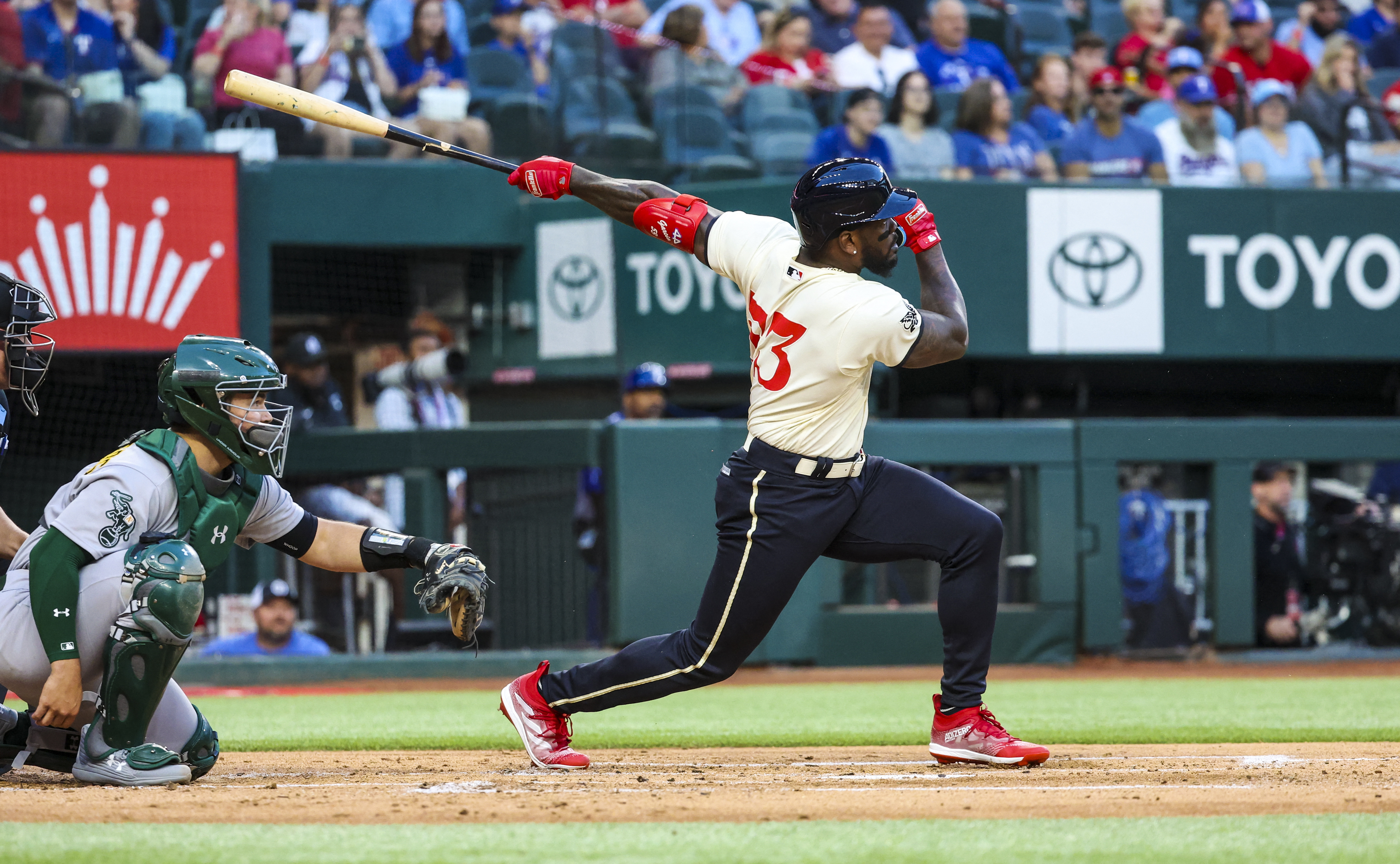 A's rally past Rangers, snap 7-game losing skid