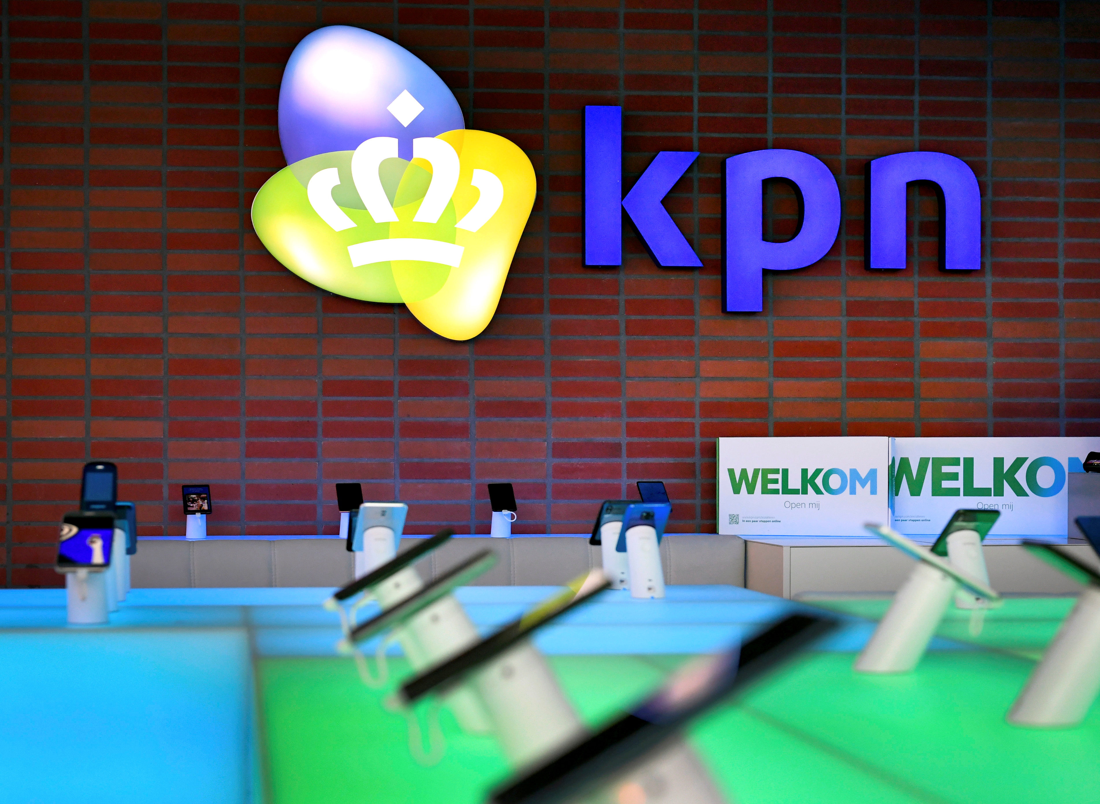 The KPN logo is seen at the telecoms company's headquarters in Rotterdam, Netherlands, January 30, 2019. REUTERS/Piroschka van de Wouw/File Photo