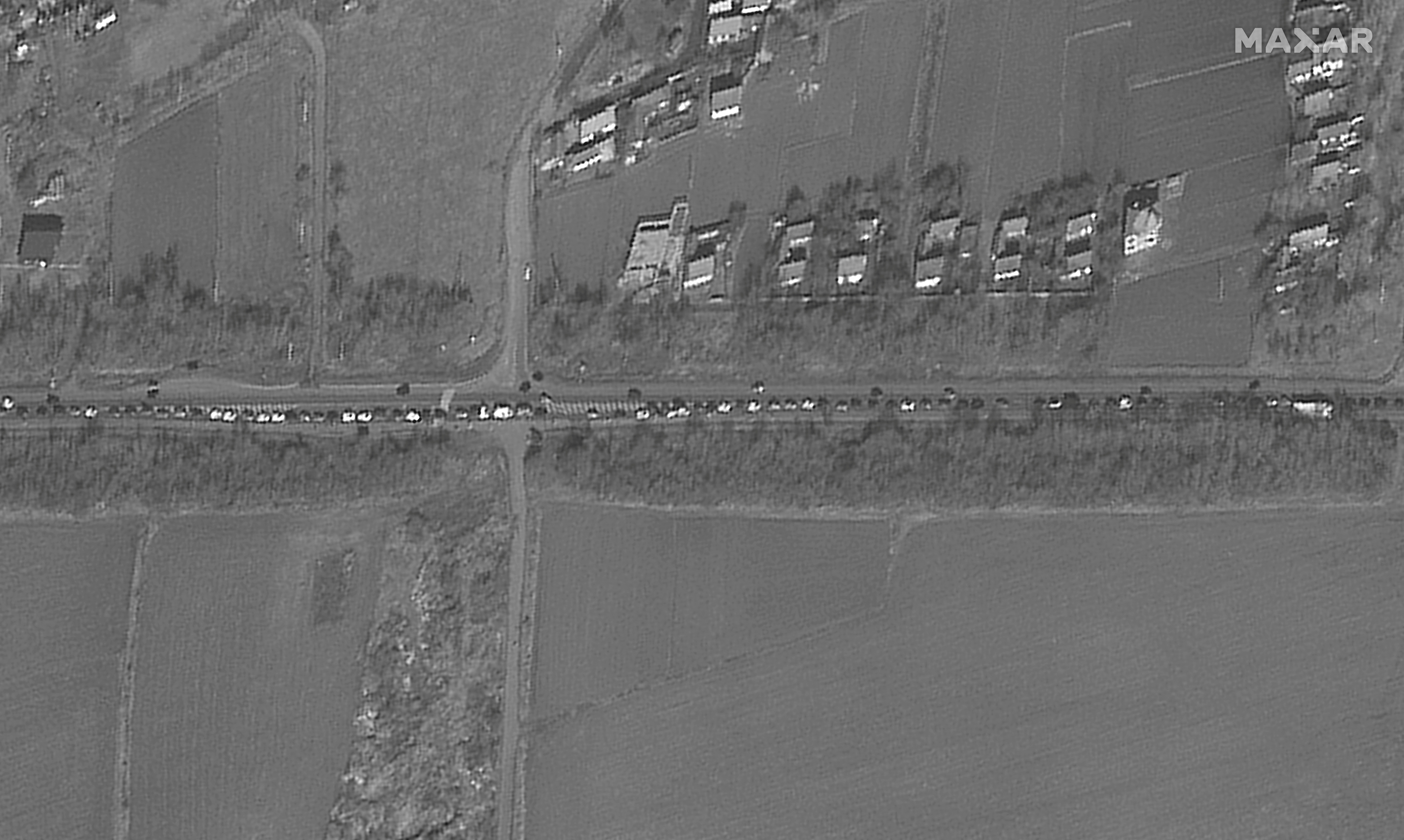 A satellite image shows a long traffic jam of vehicles leaving Ukraine, near Siret, Romania February 25, 2022. Courtesy of Satellite image 2022 Maxar Technologies/Handout via REUTERS 