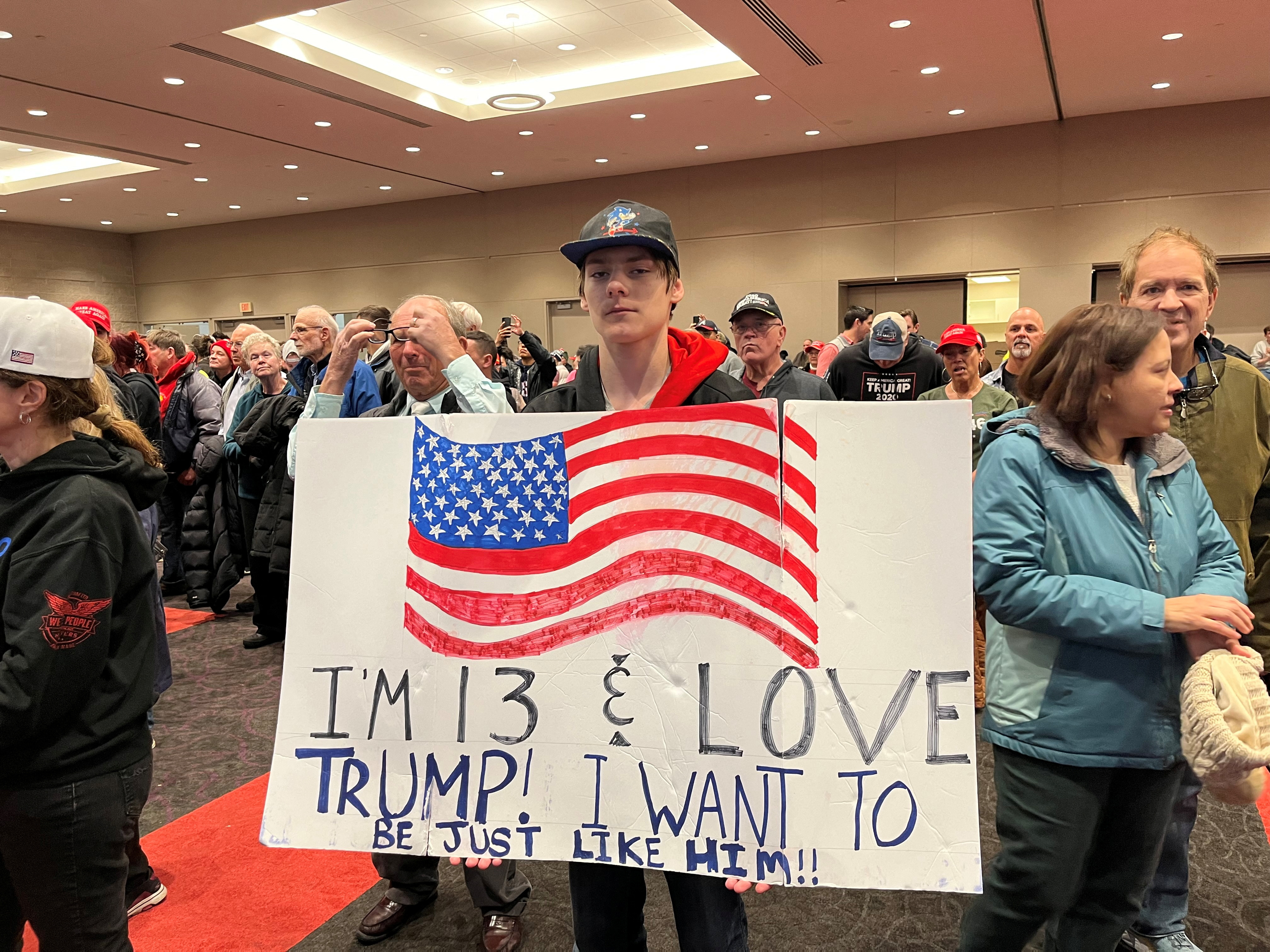 At Trump rally, young voters say high prices make them back him