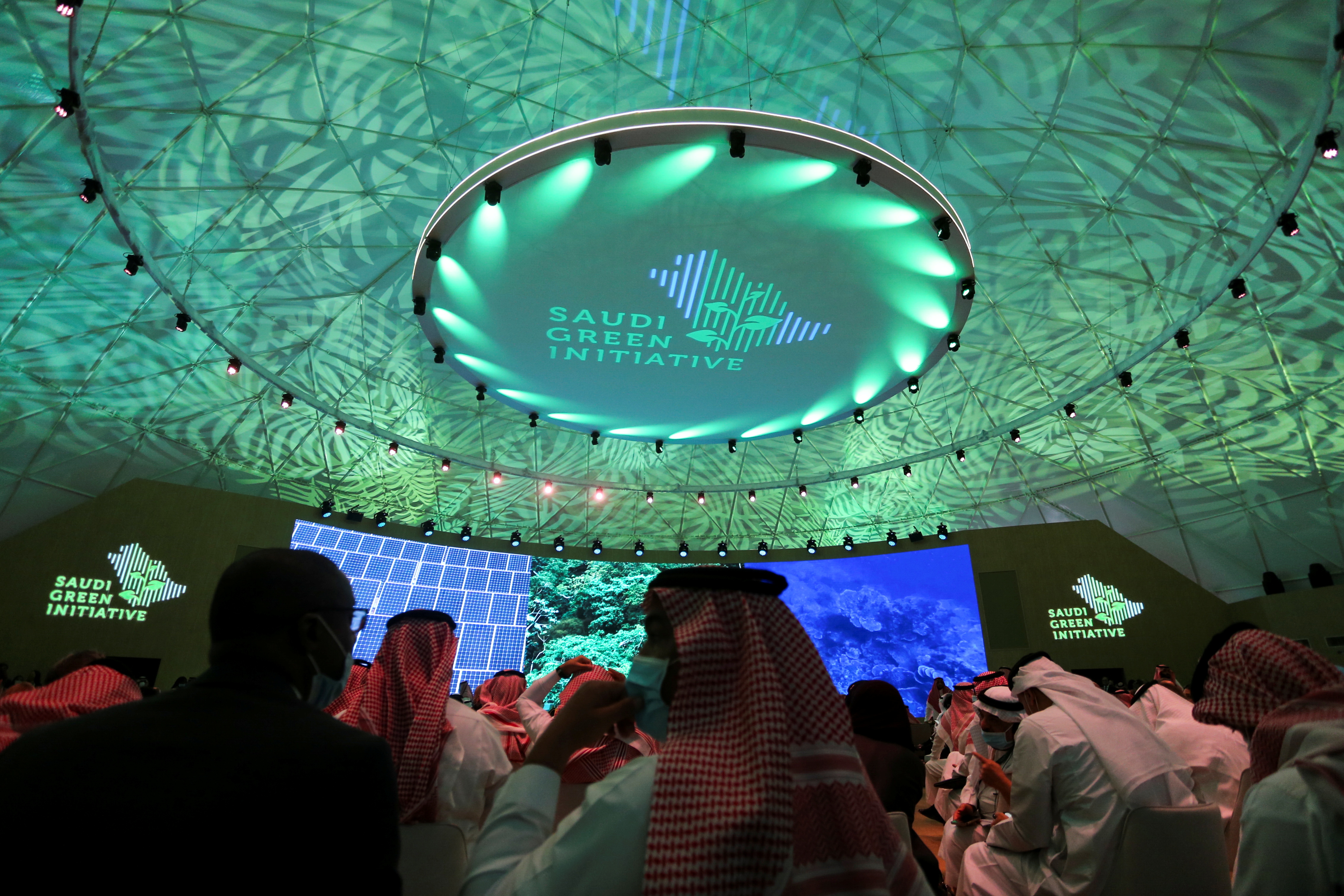 Participants attend the Saudi Green Initiative Forum to discuss efforts by the world's top oil exporter to tackle climate change, in Riyadh, Saudi Arabia, October 23, 2021. REUTERS/Ahmed Yosri