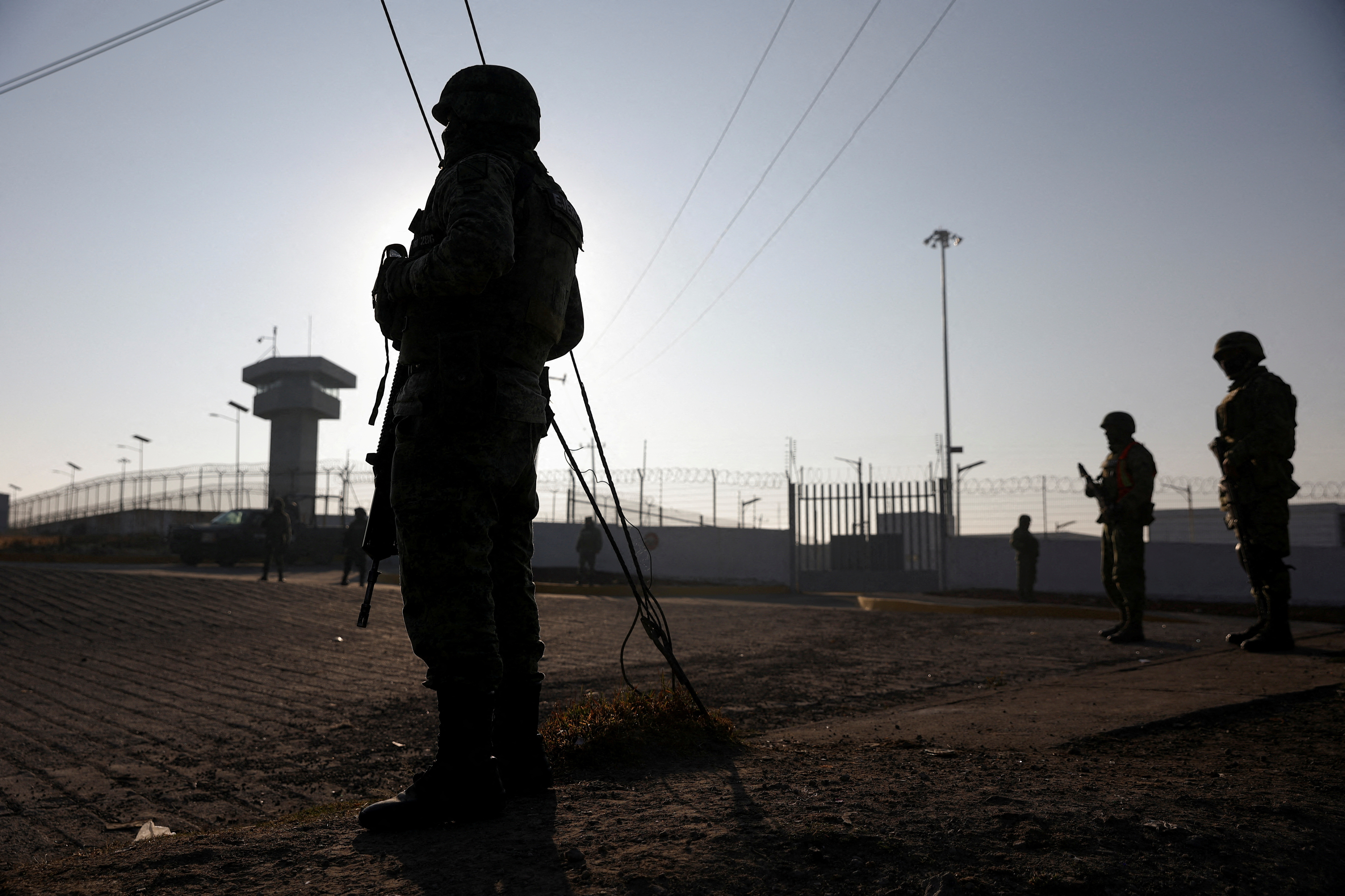 Security forces stand outside of high security prison where Mexican drug leader Ovidio Guzman is imprisoned, in Almoloya de Juarez