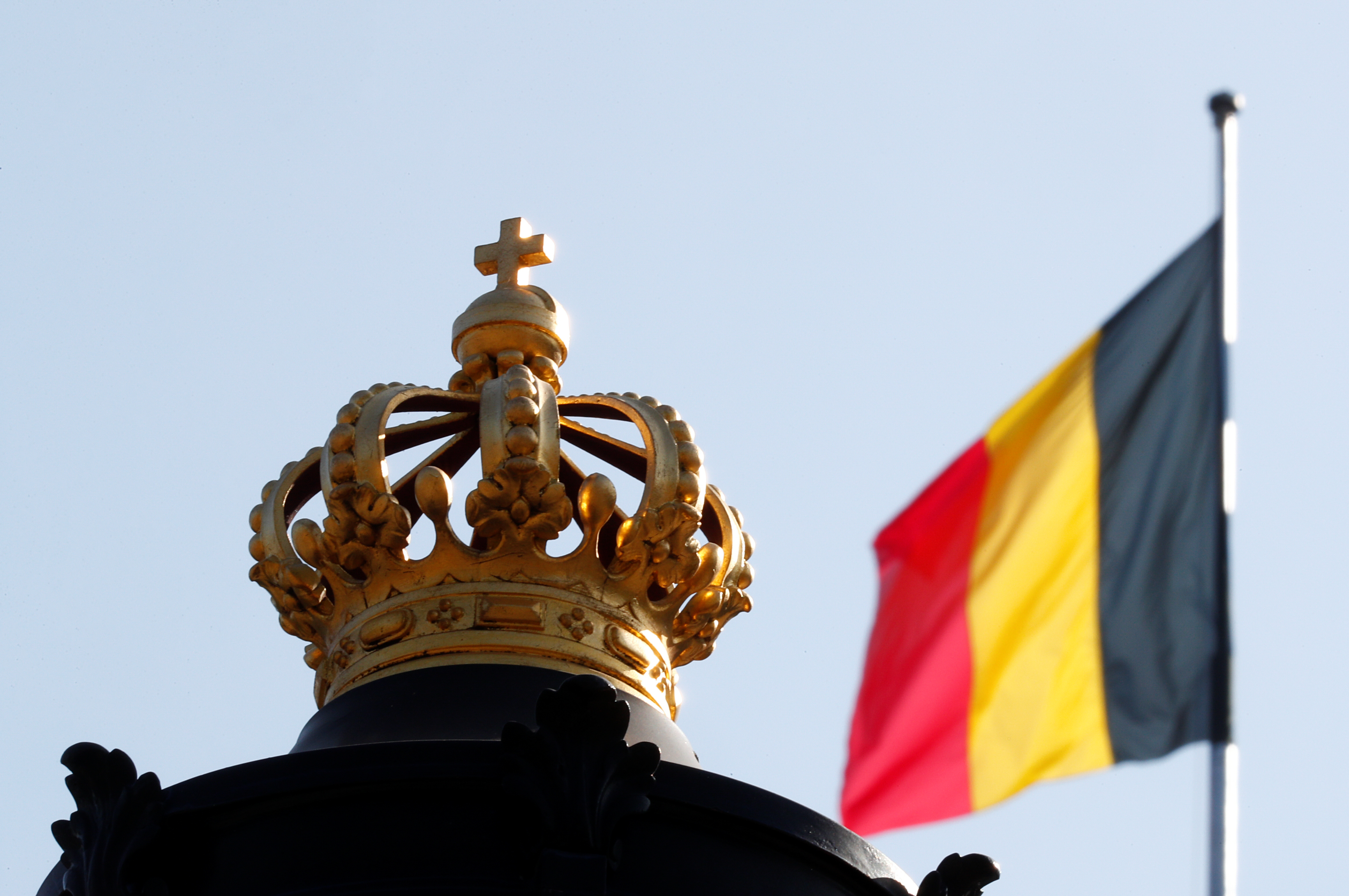 The Belgian flag is seen outside Brussels Royal Palace during negotiations to form a government, in Brussels