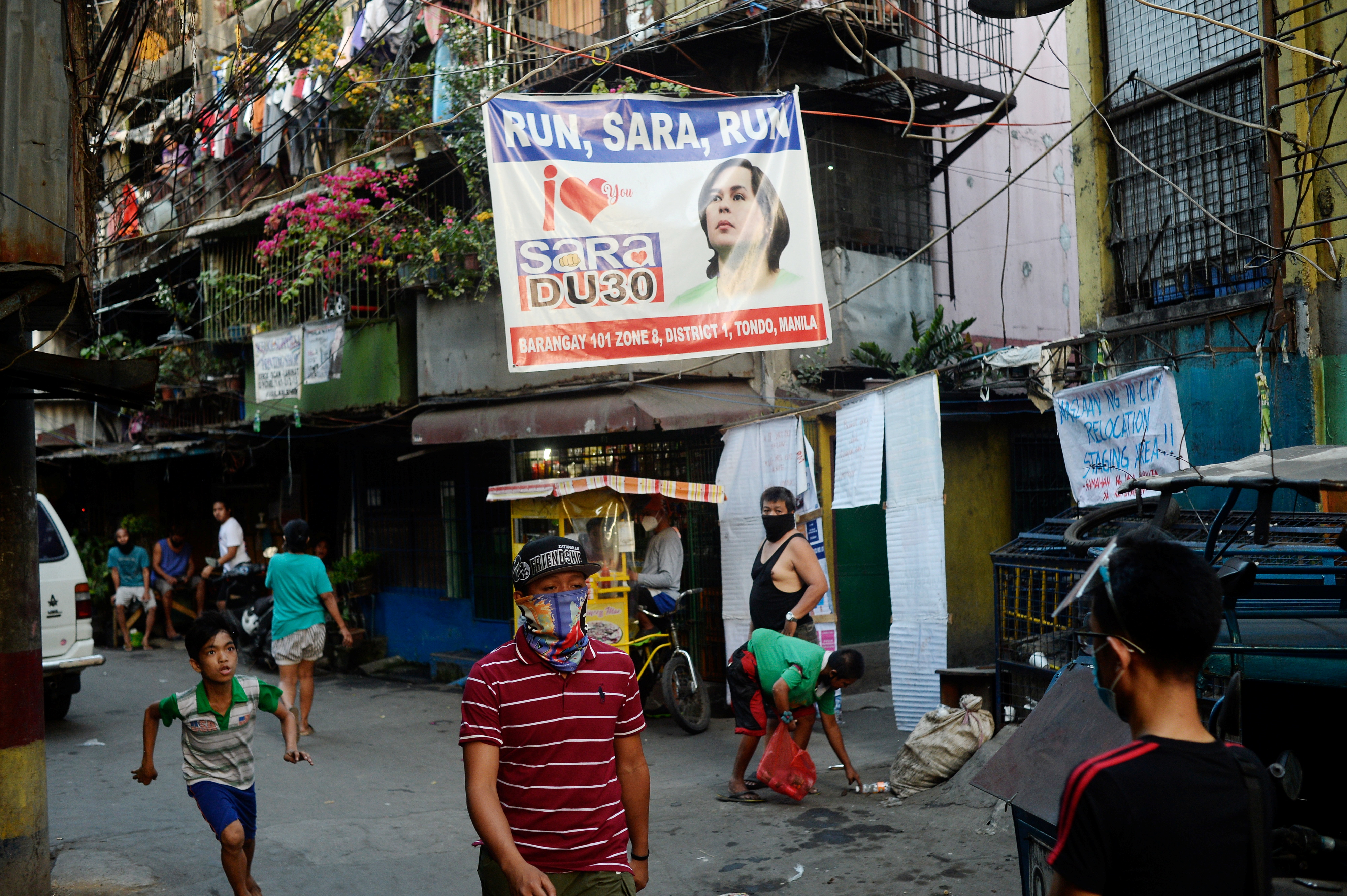 A banner showing support for Davao City Mayor Sara Duterte to run for president is seen in a community in Manila, Philippines