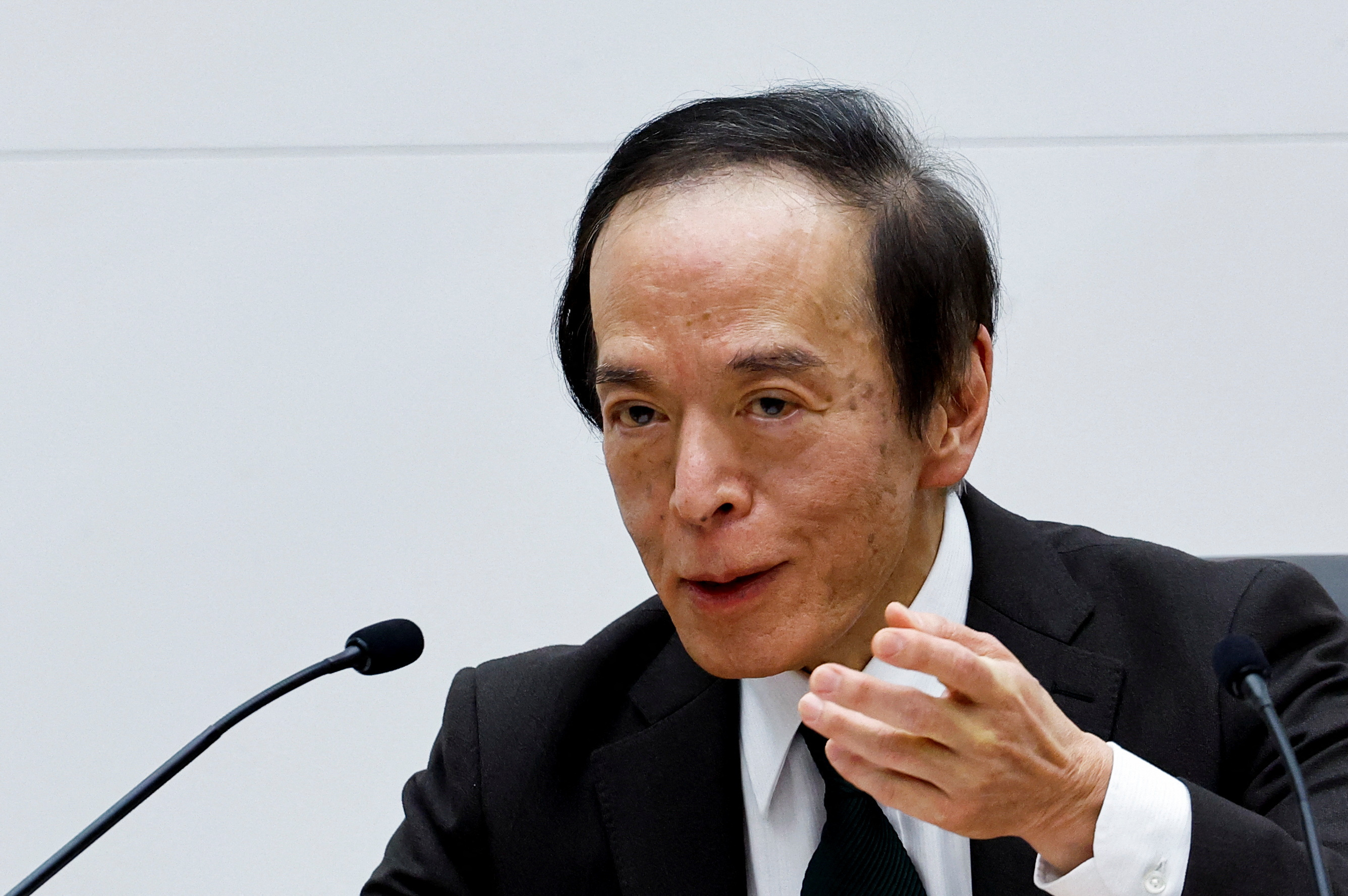 Bank of Japan Governor Kazuo Ueda attends a press conference in Tokyo