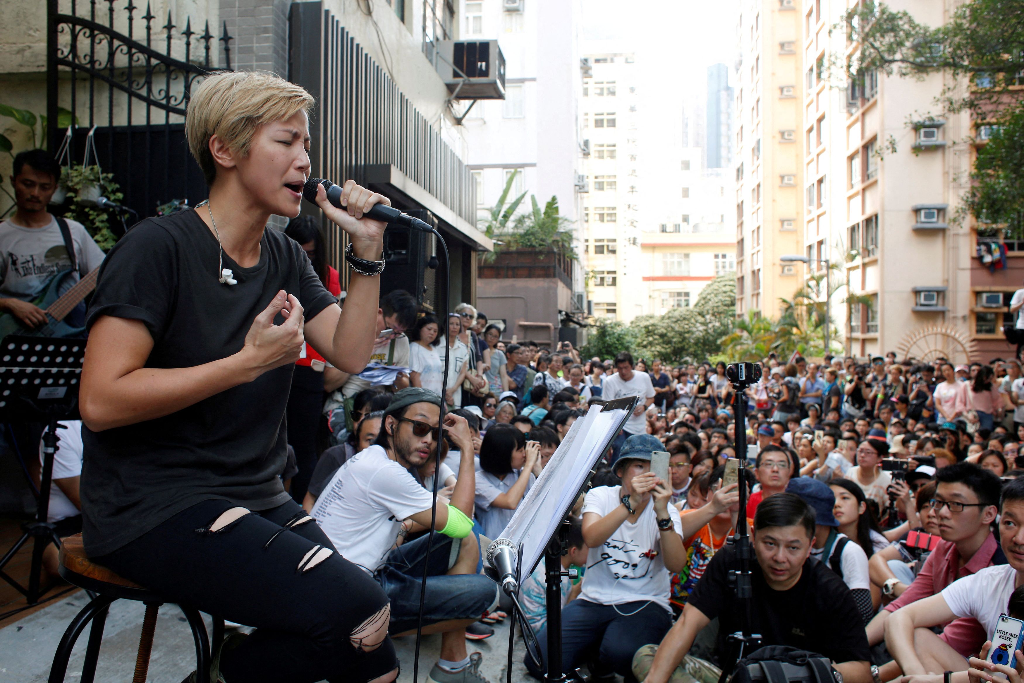 Hong Kong pro-democracy singer Denise Ho performs at a free concert in Hong Kong