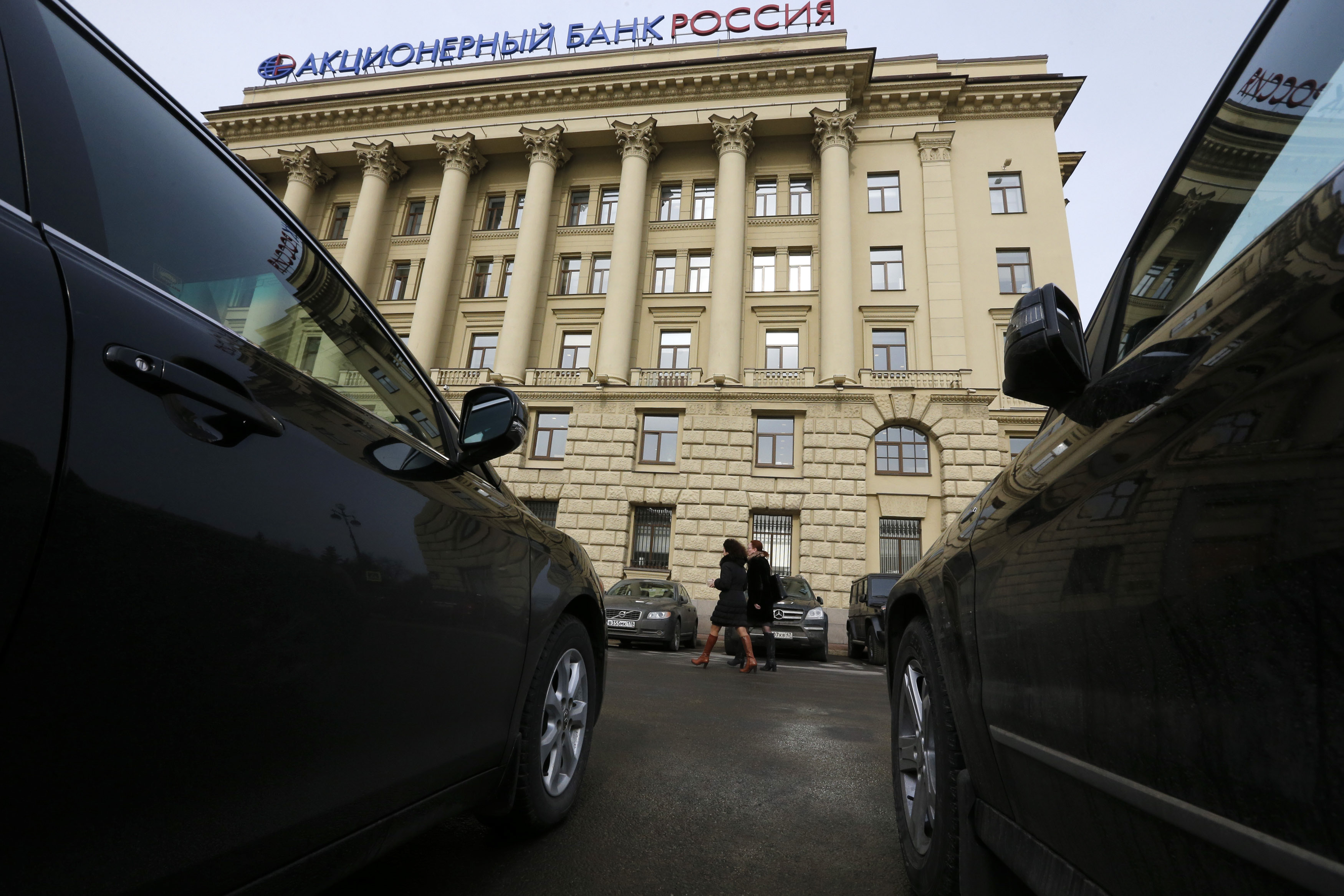 Britain sanctions Russian oligarch Timchenko and five banks | Reuters 