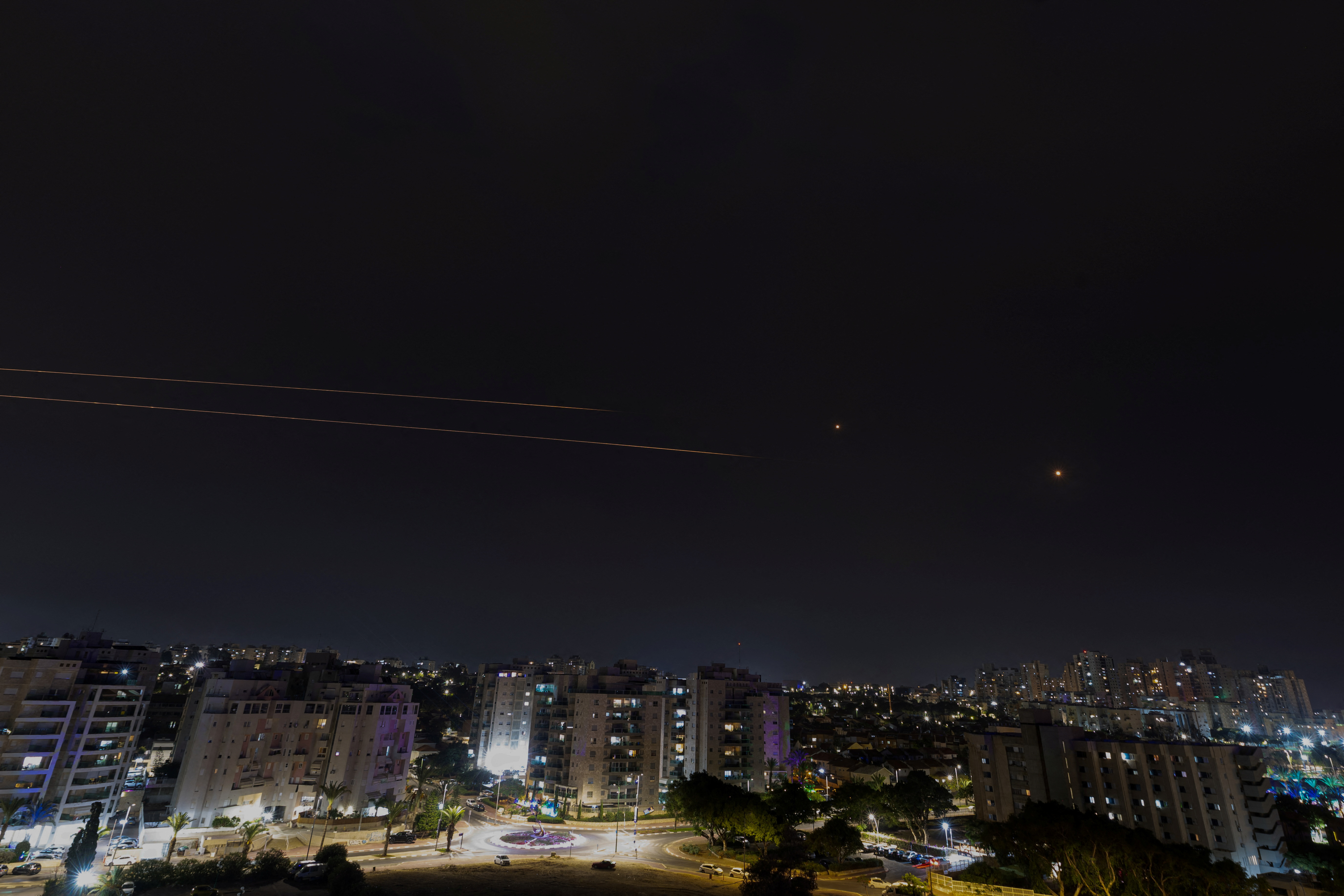 Israel's Iron Dome anti-missile system intercepts rockets launched from the Gaza Strip, as seen from Ashkelon