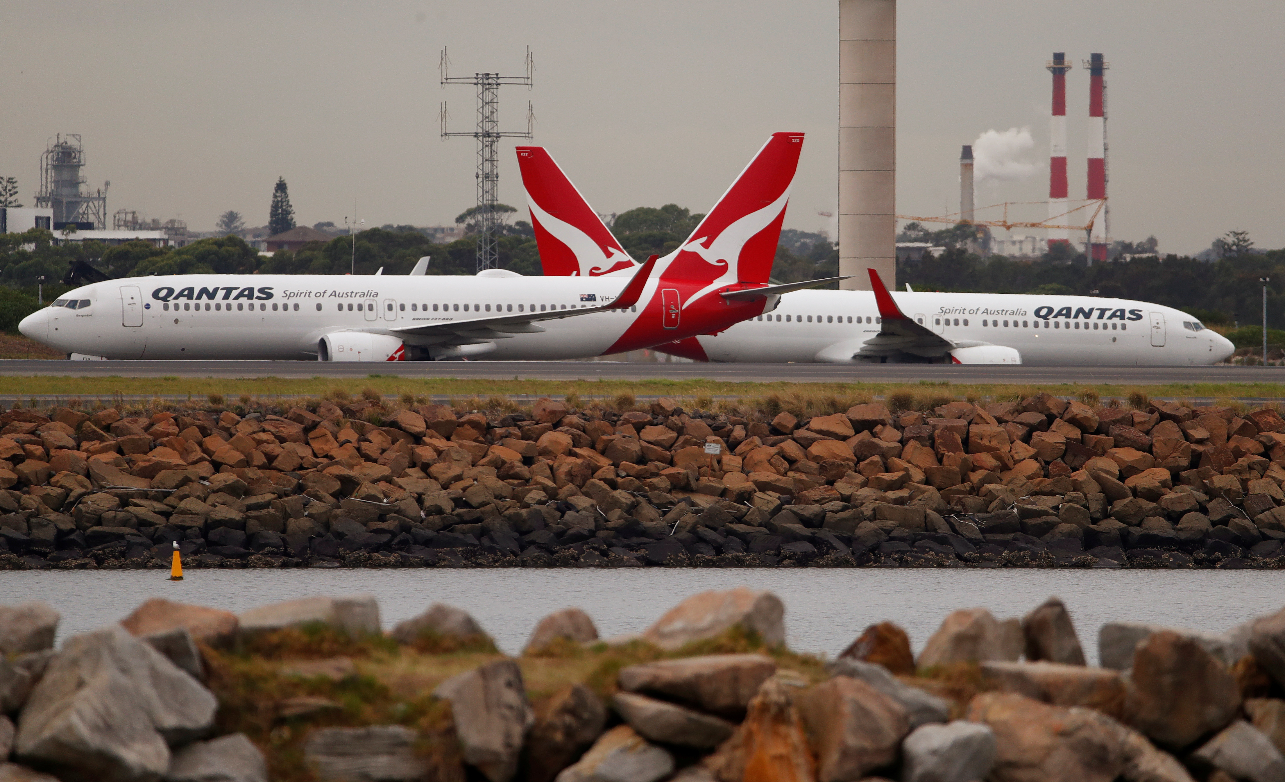 Qantas Boeing 737 planes taxi at Kingsford Smith International Airport in Sydney, Australia