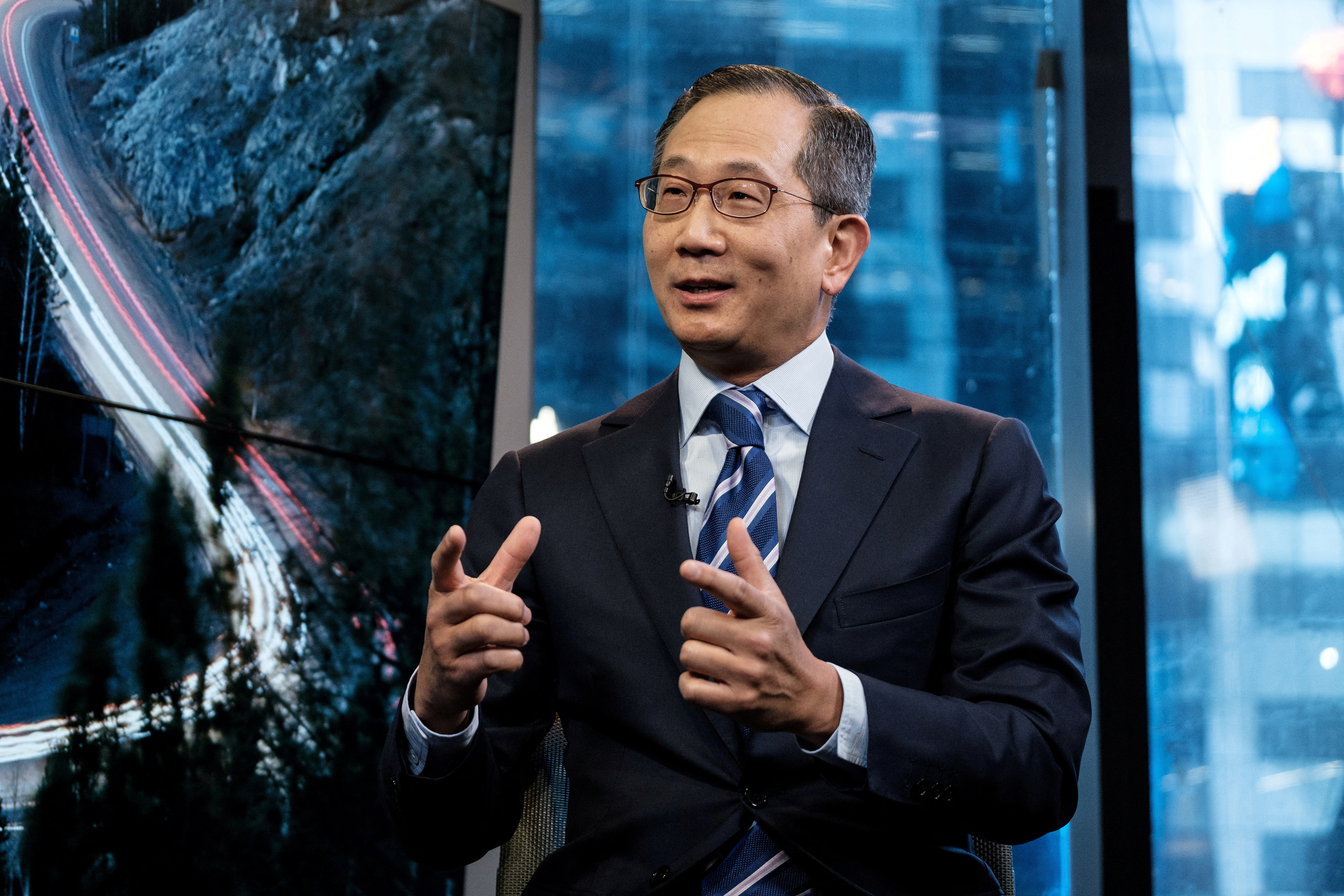 Carlyle Group CEO Kewsong Lee speaks during a Reuters Newsmaker event in New York