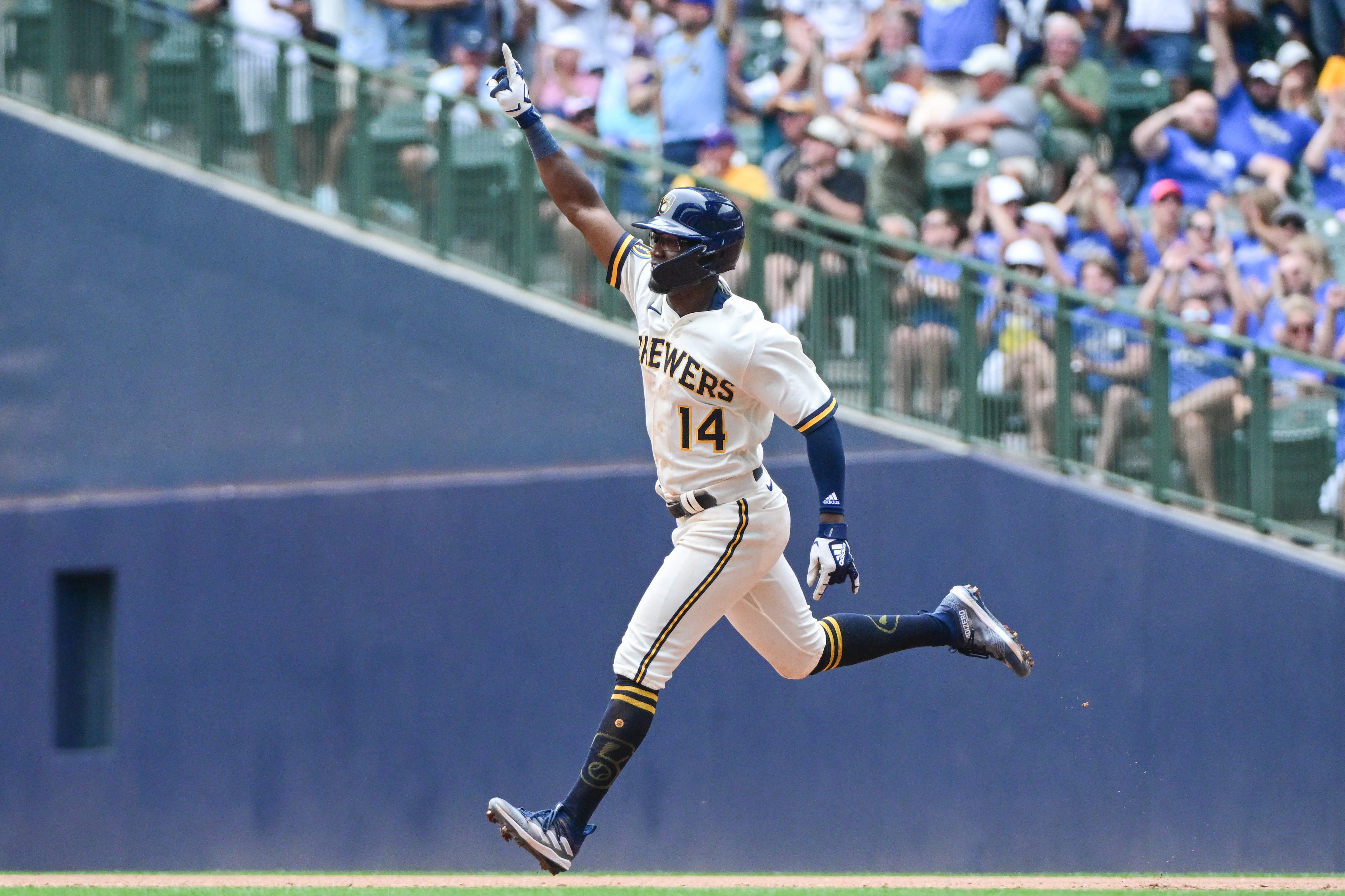 Brewers beat Rockies 7-6 in 10 innings as Mark Canha scores