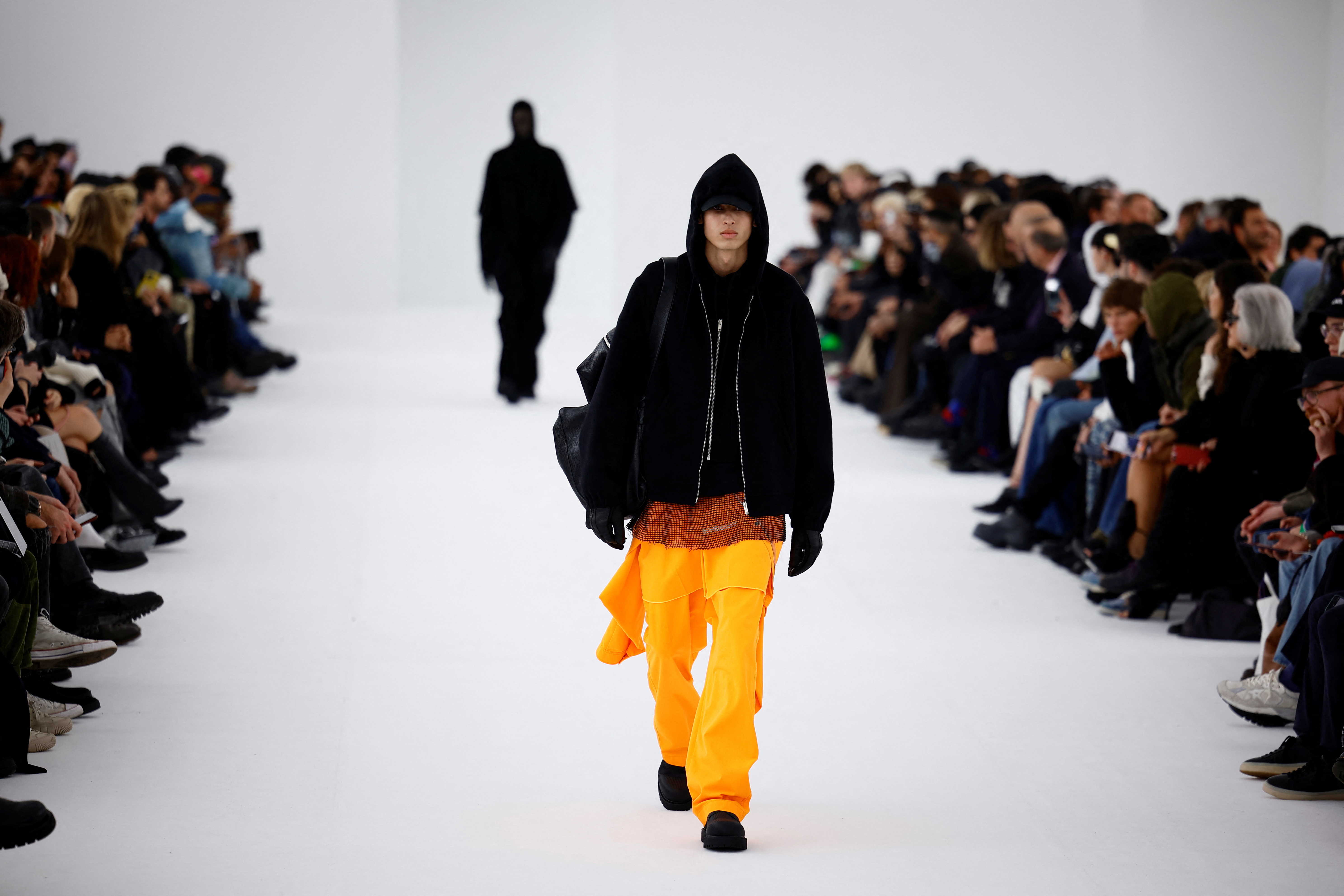 Givenchy doubles down on suits and hoodies at Paris Fashion Week | Reuters