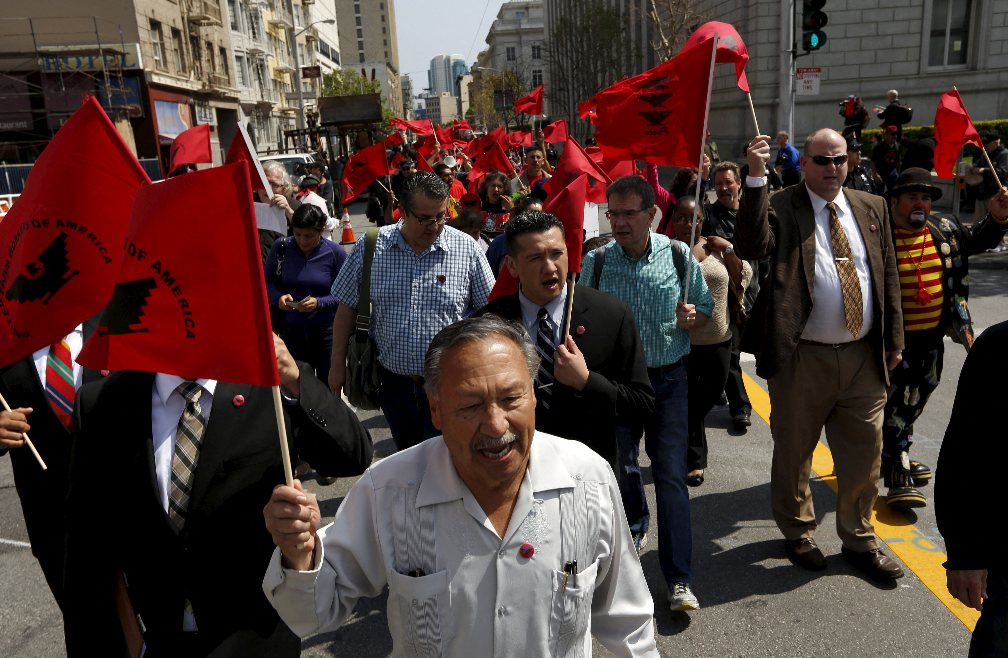 United Farm Workers President Arturo Rodriguez leads workers in a march to City Hall in San Francisco