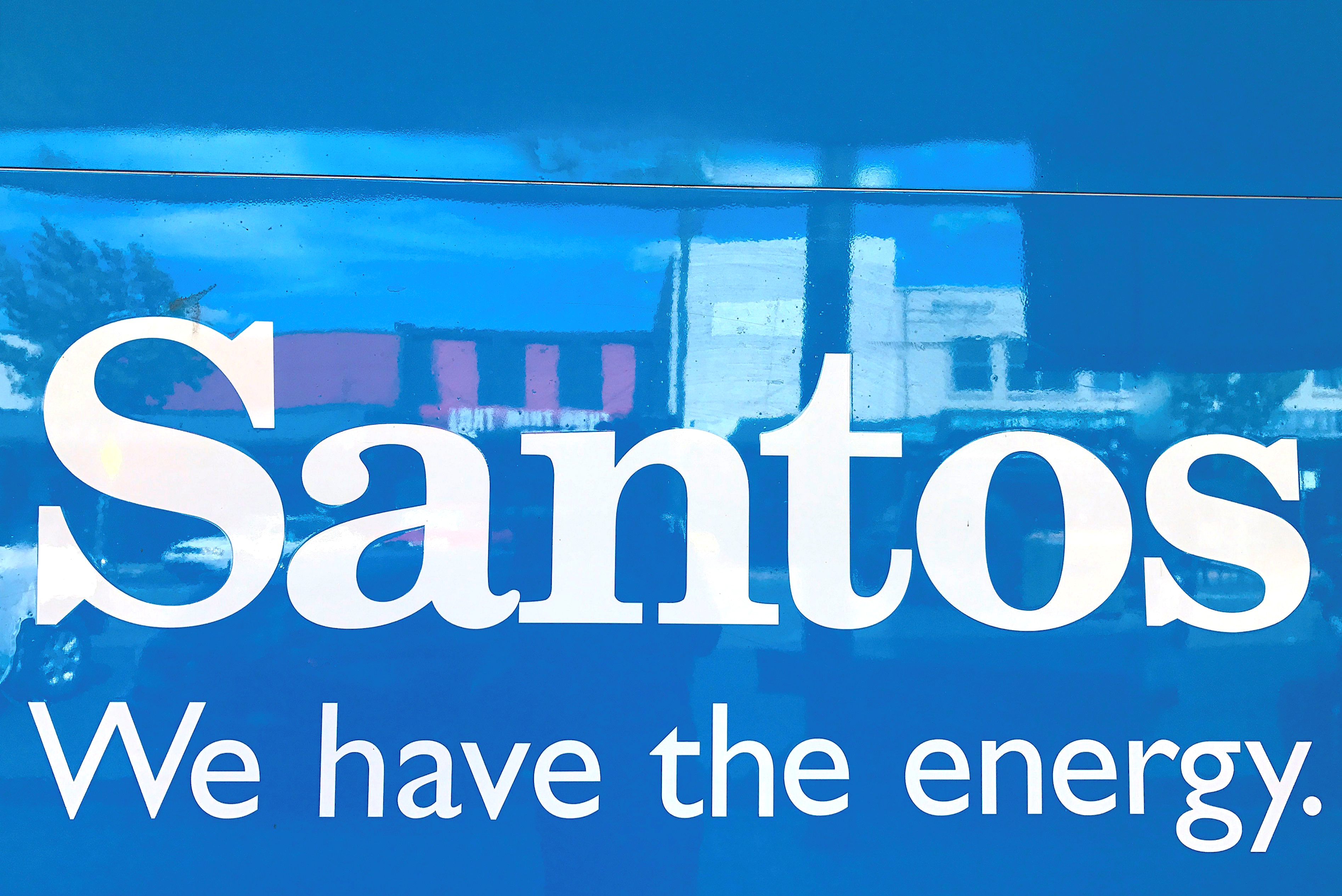A sign for Santos Ltd, Australia's No. 2 independent gas producer, is displayed on the front of the company's office building in the rural township of Gunnedah, located in north-western New South Wales