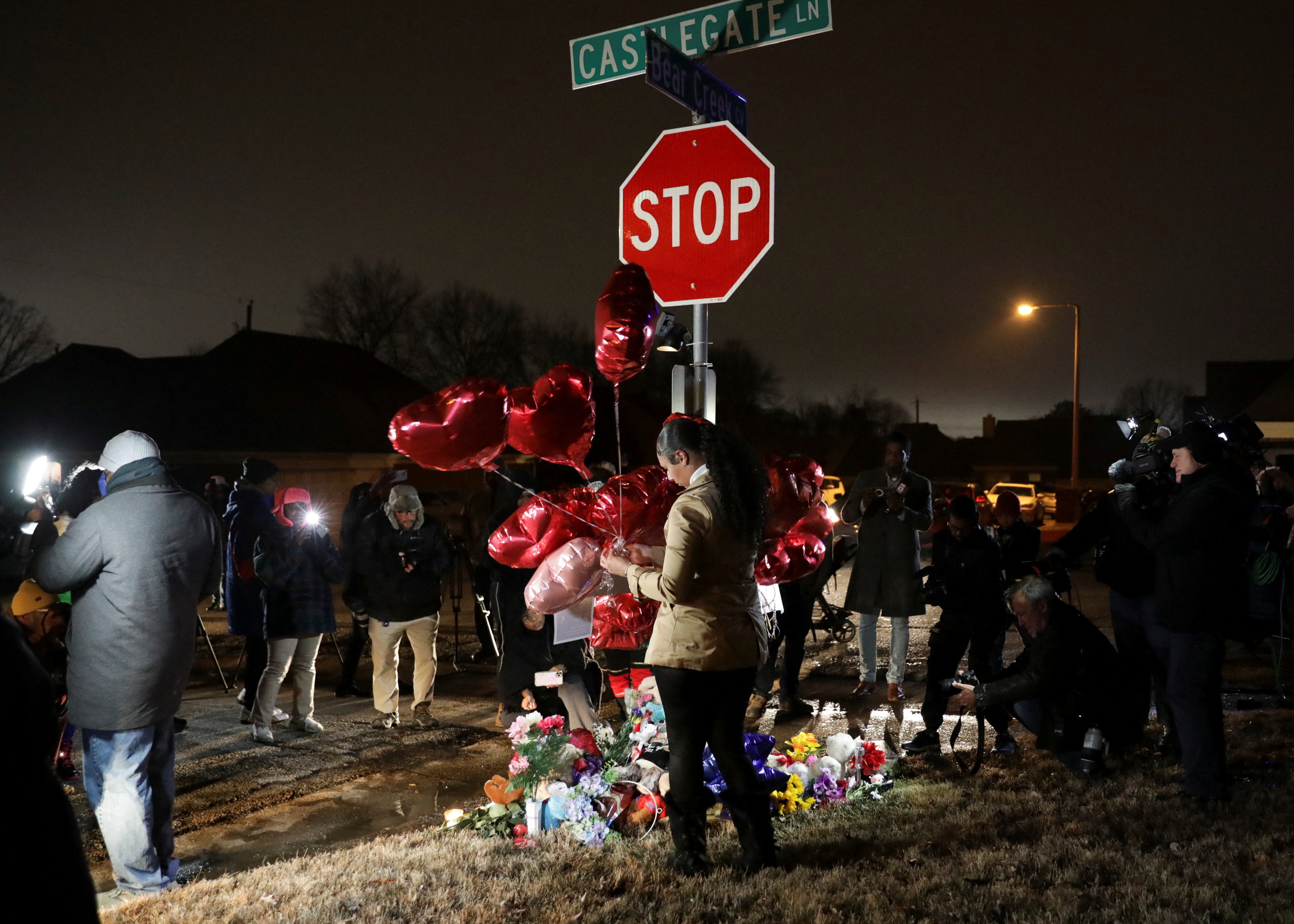 People participate in a vigil at the intersection where Tyre Nichols was beaten by Memphis Police officers, in Memphis
