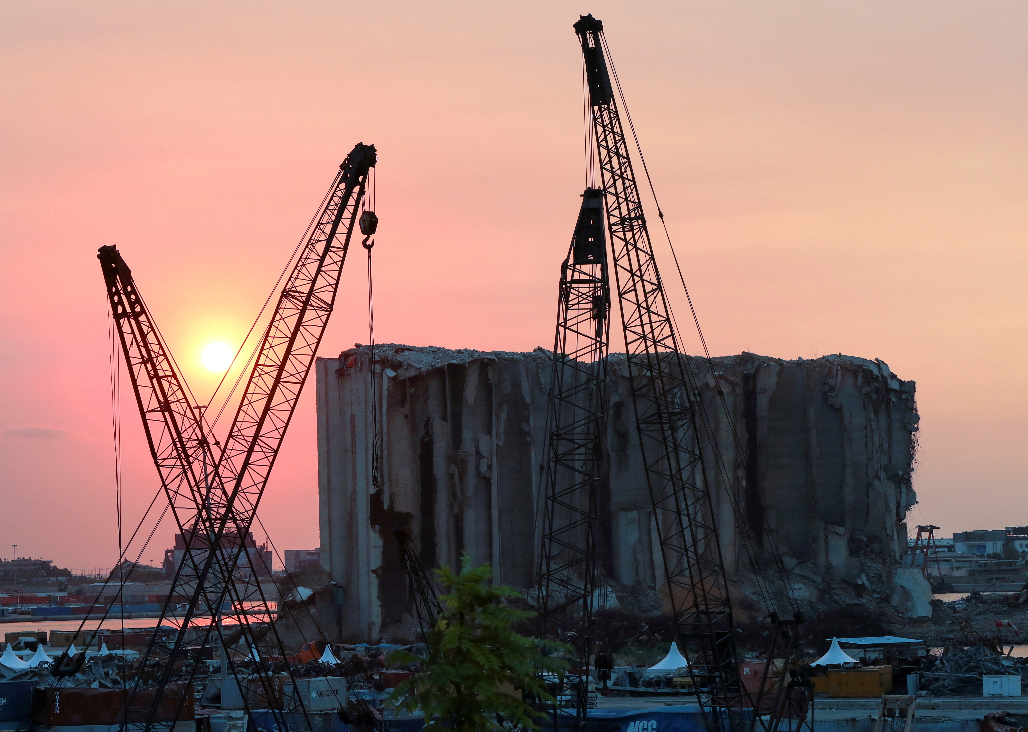 A view shows the grain silo that was damaged during last year's Beirut port blast, during sunset in Beirut
