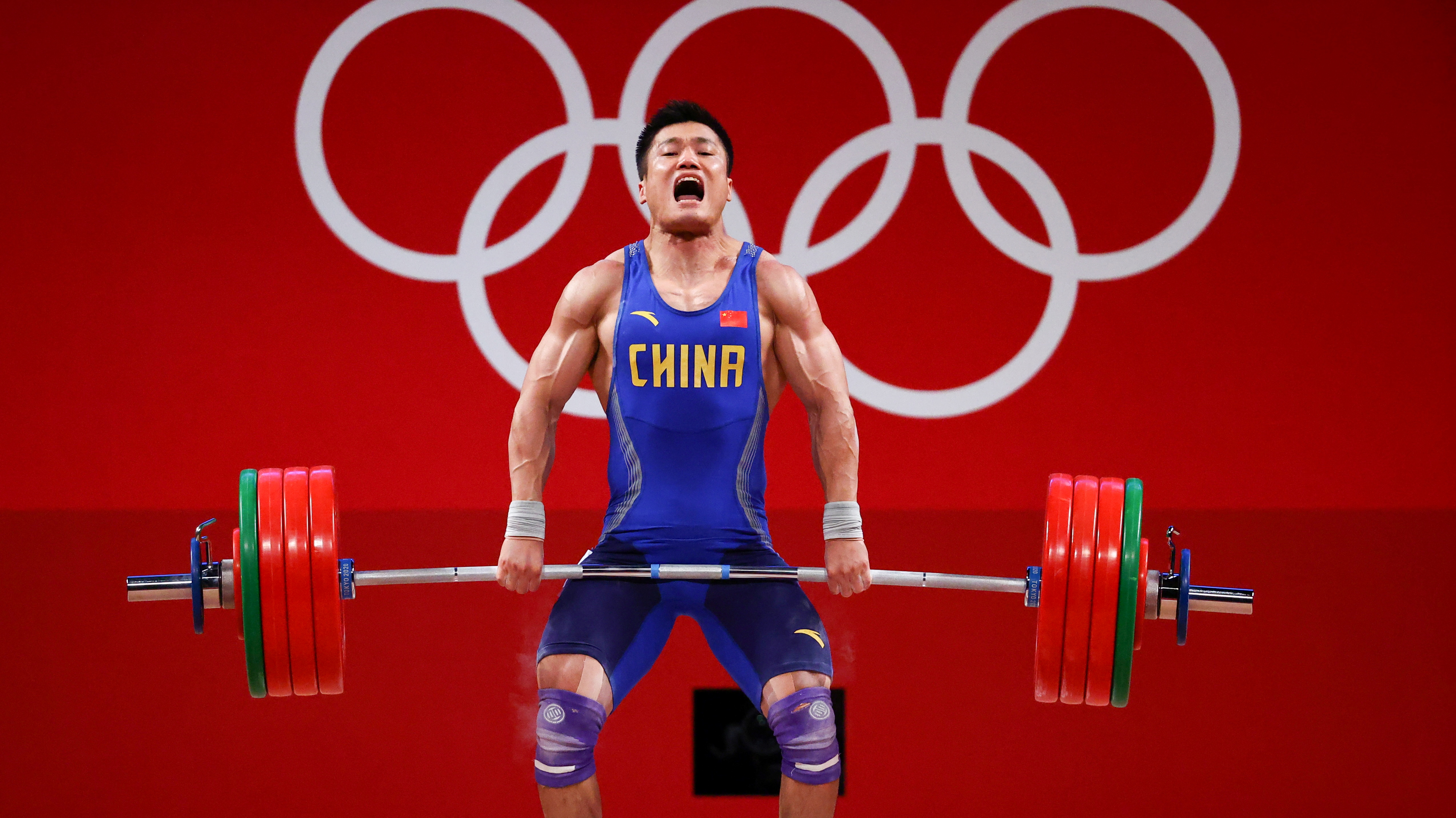 Weightlifting-China's veteran Lyu wins gold in men's 81kg | Reuters