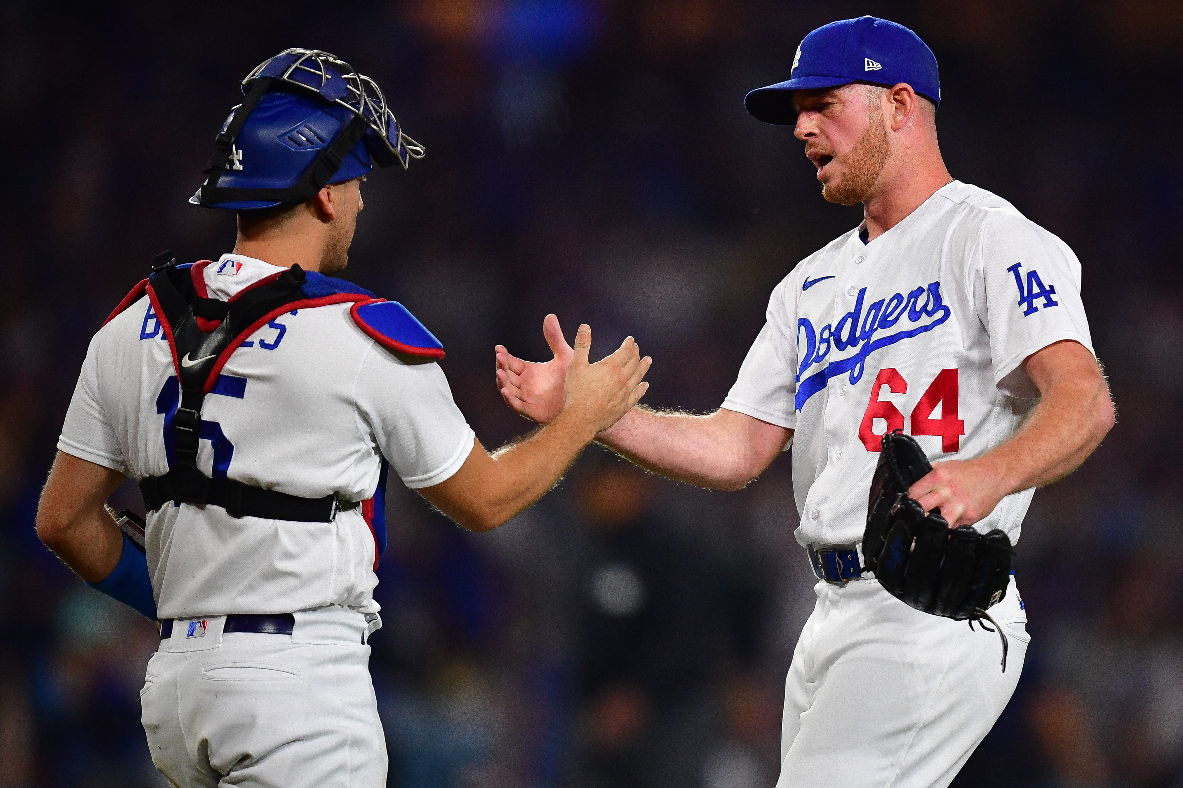 Clayton Kershaw gets first major league save as Dodgers clinch