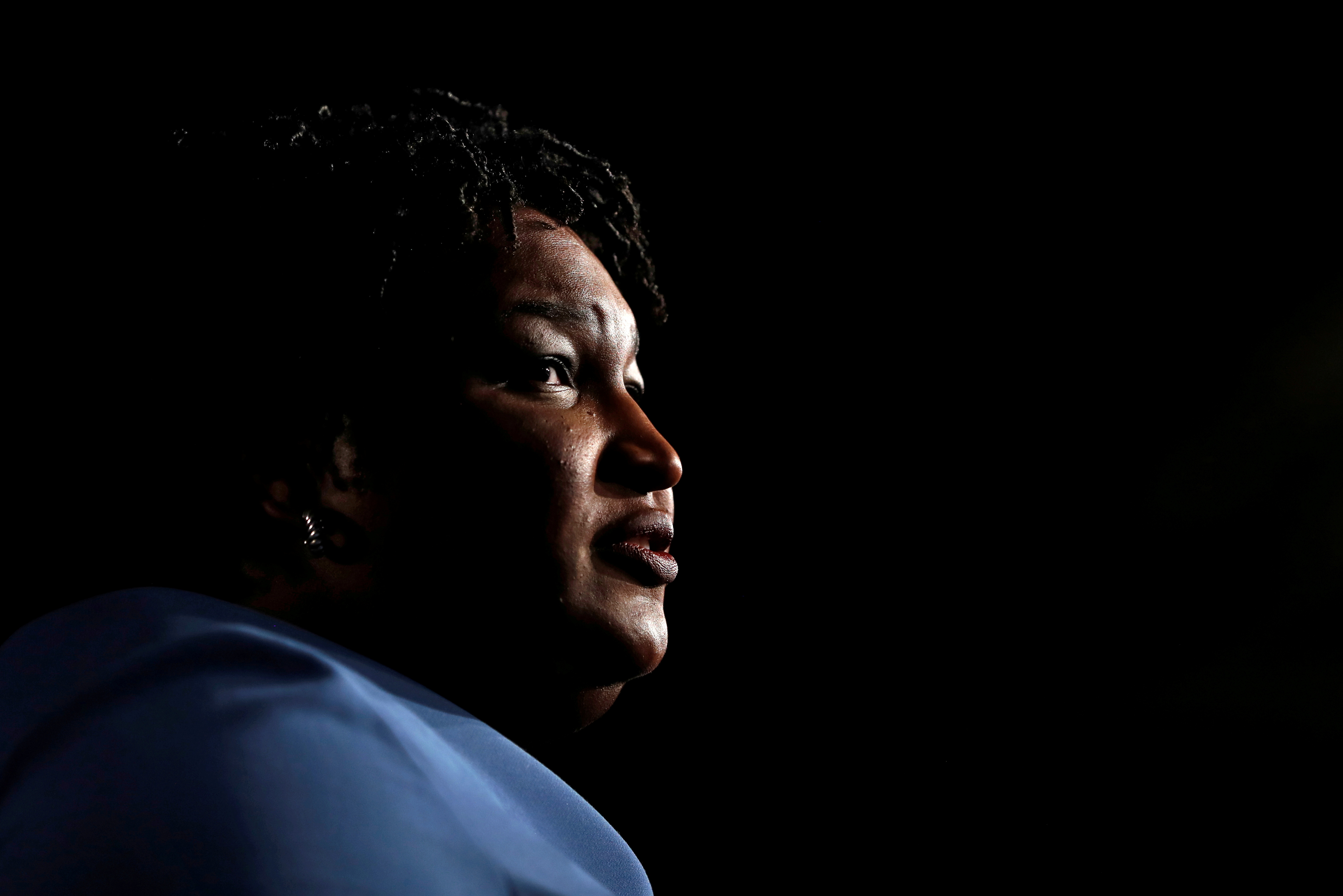 Georgia Democratic gubernatorial nominee Stacey Abrams speaks to supporters during a midterm election night party in Atlanta, Georgia, U.S., November 7, 2018. REUTERS/Leah Millis/File Photo
