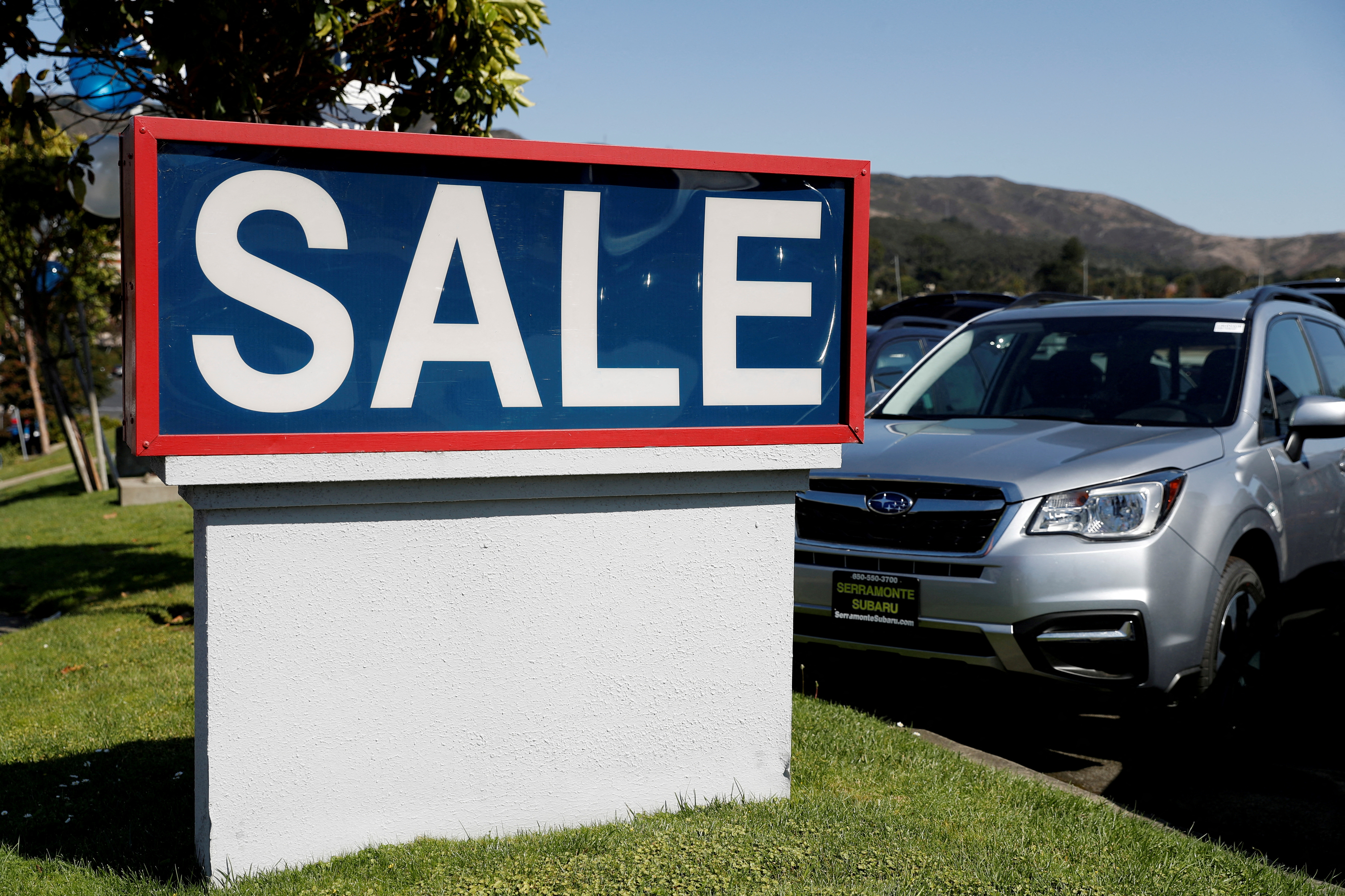 A sale sign is seen at car dealer Serramonte Subaru in Colma, California